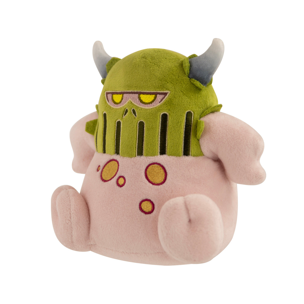 Peluche mostro verde con corpo rosa e casco verde, seduto.