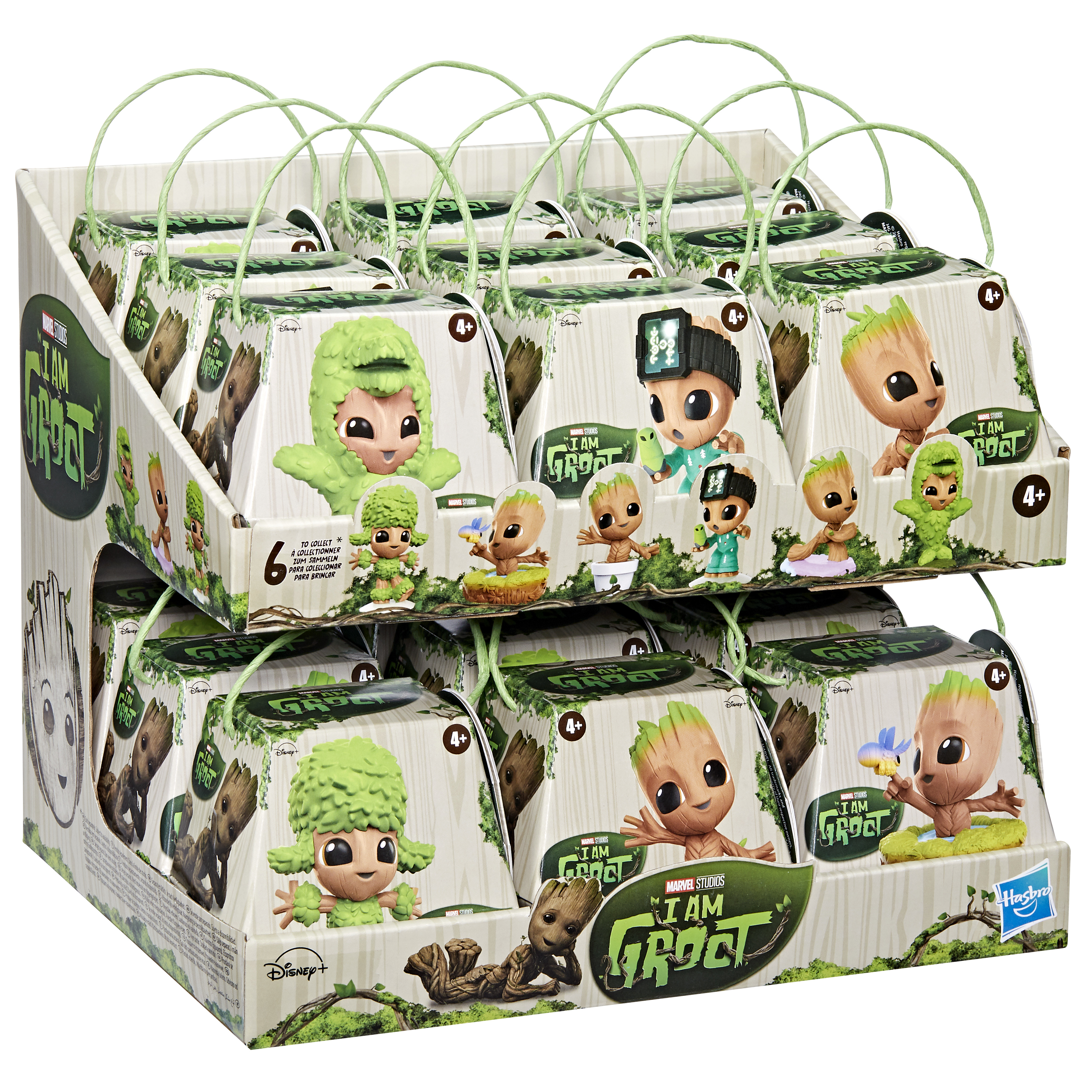 Espositore con più personaggi giocattolo I Am Groot in scatole. Colori verdi e bianchi.