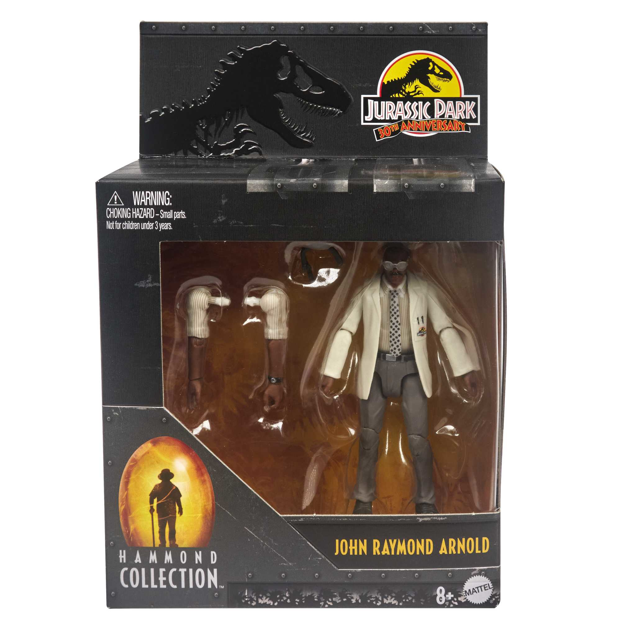 Un action figure di Jurassic Park di John Raymond Arnold in una scatola con accessori.