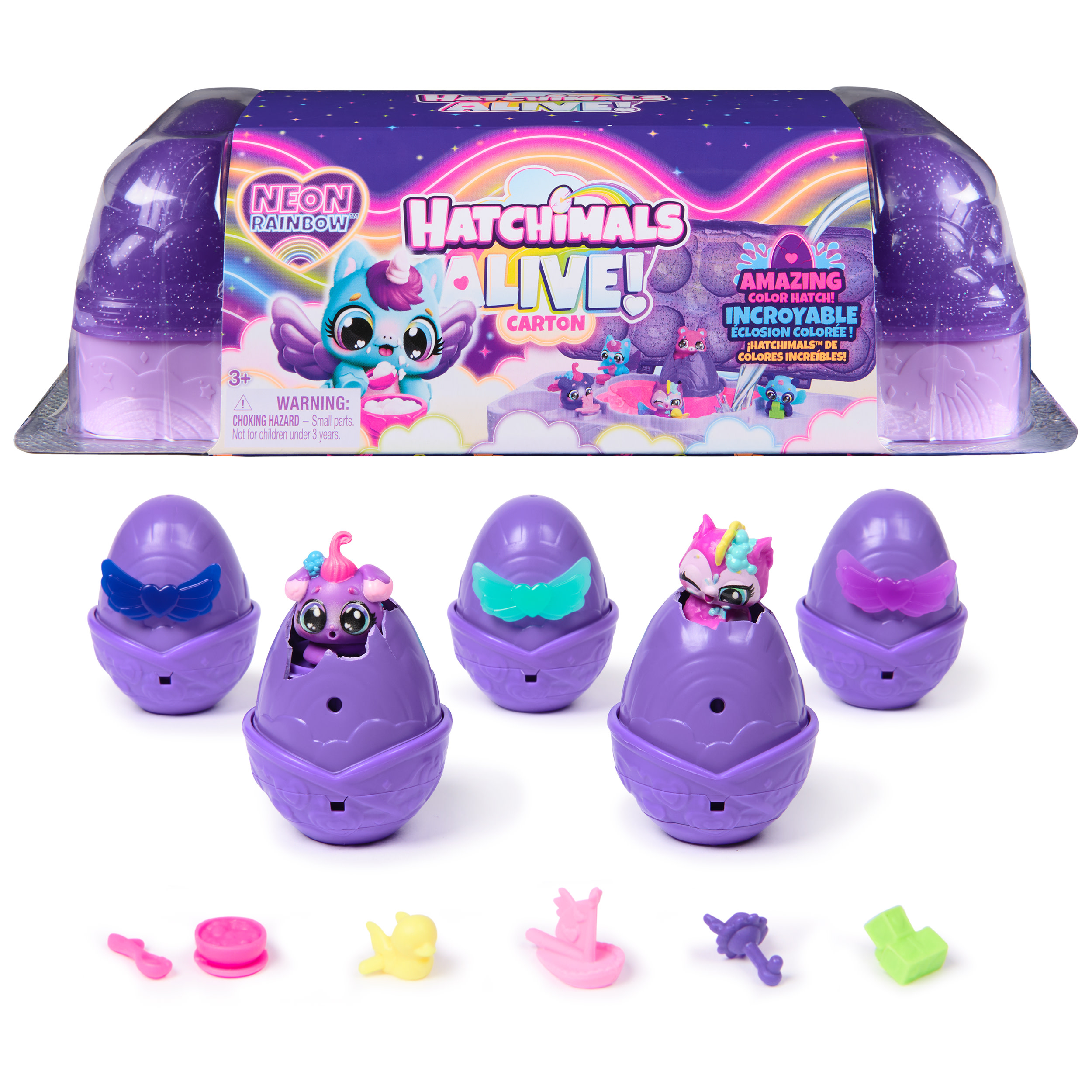 Hatchimals-Spielzeugset. Fünf lila Eier, teilweise geöffnet, mit kleinen Figuren darin. Bunte Box im Hintergrund.