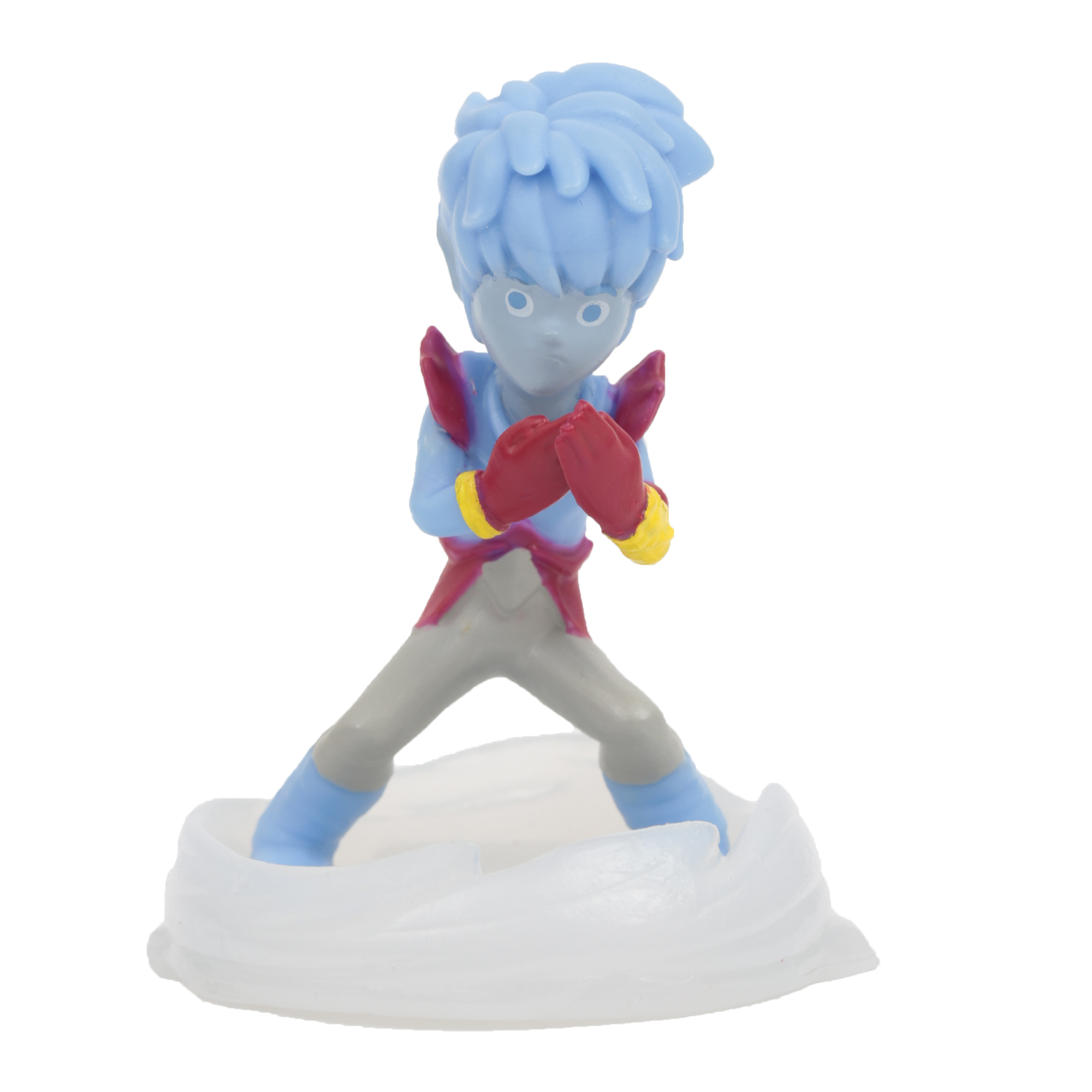 Una figura azul con guantes rojos y una chaqueta roja. Está sobre una base blanca en forma de nube.