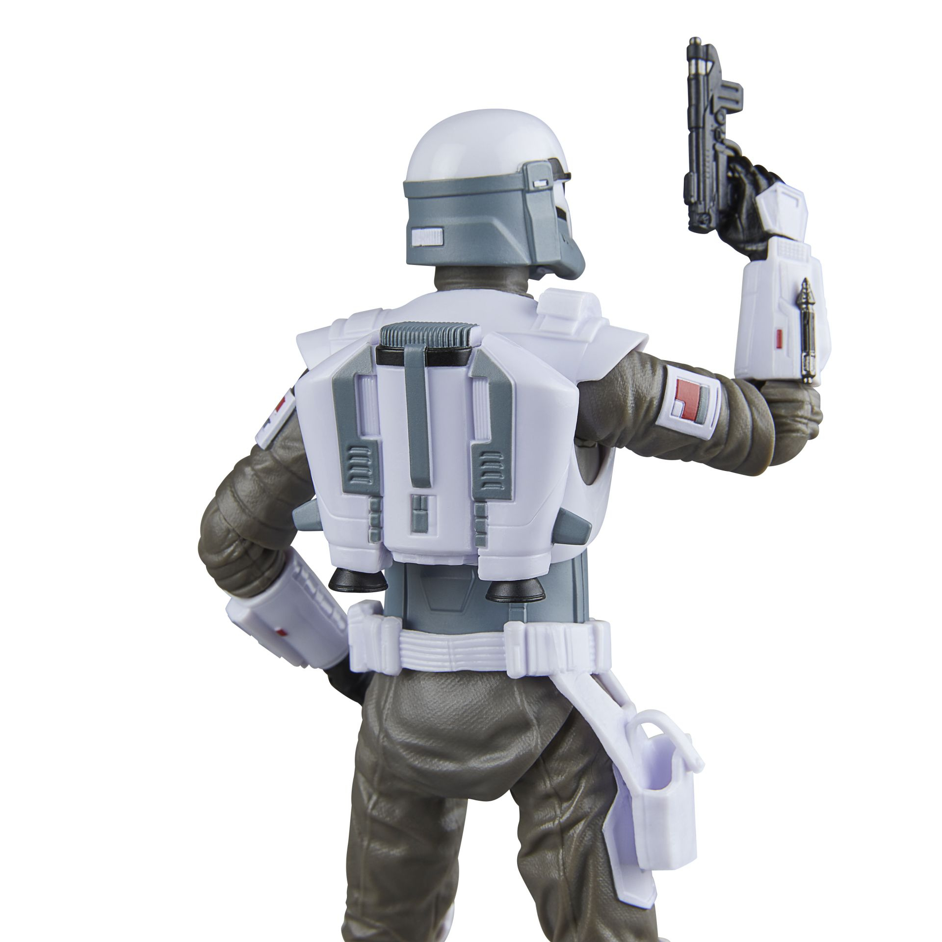 A Star Wars figure from the back, wearing white armor, holding a gun.