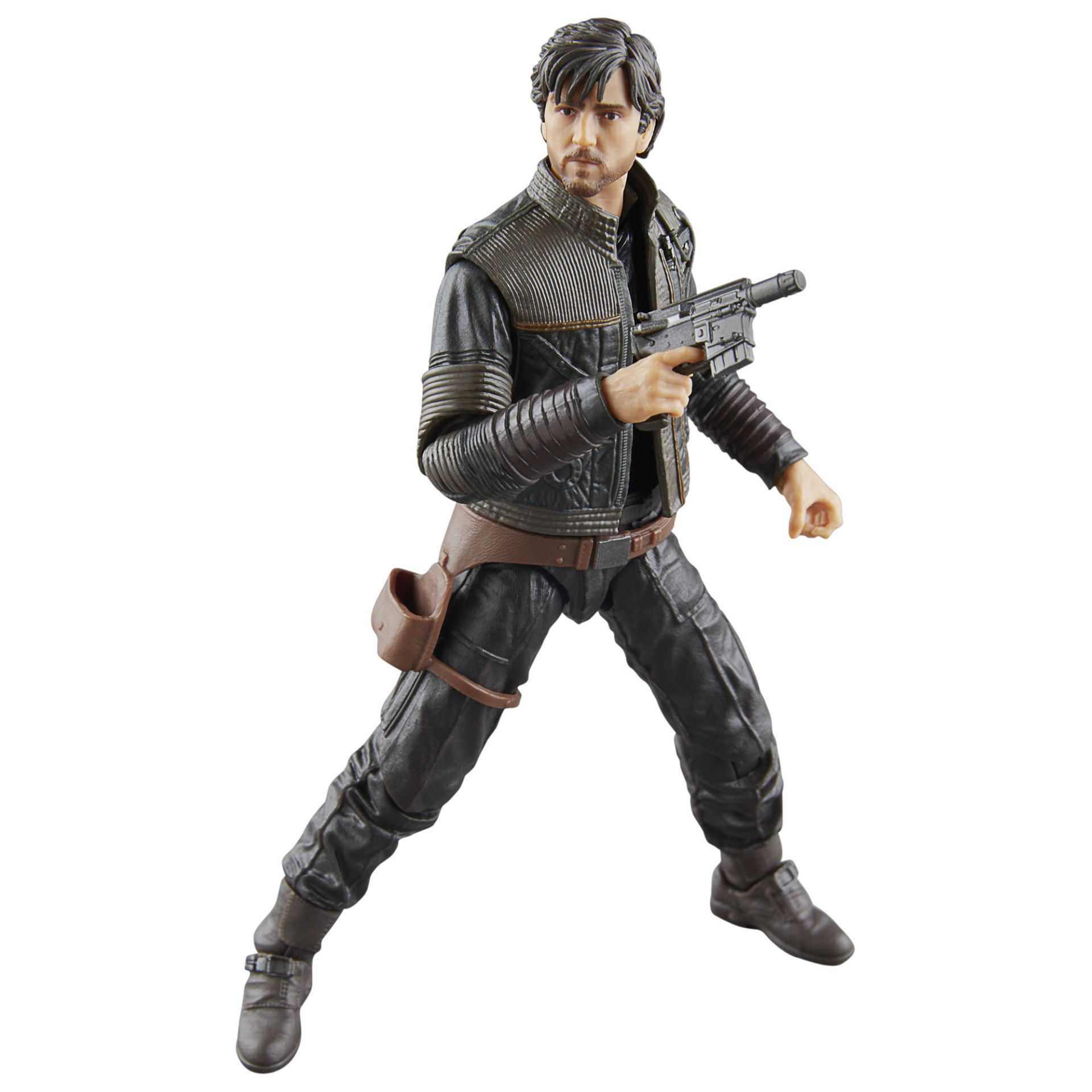 Eine Star Wars Figur eines Mannes mit einer Waffe, der eine Jacke und schwarze Hosen trägt und nach links schaut.