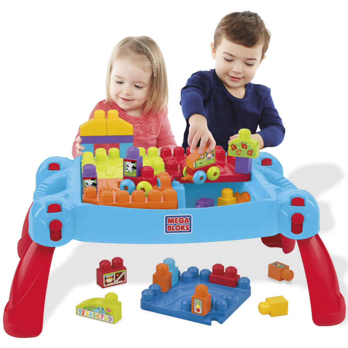 Dwoje dzieci bawiących się klockami. Niebieski stół z klockami i zabawkami. Jasne kolory.