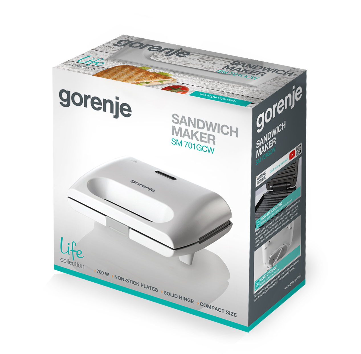 Toster Gorenje w pudełku. Biały i jasnoszary, z widoczną marką.