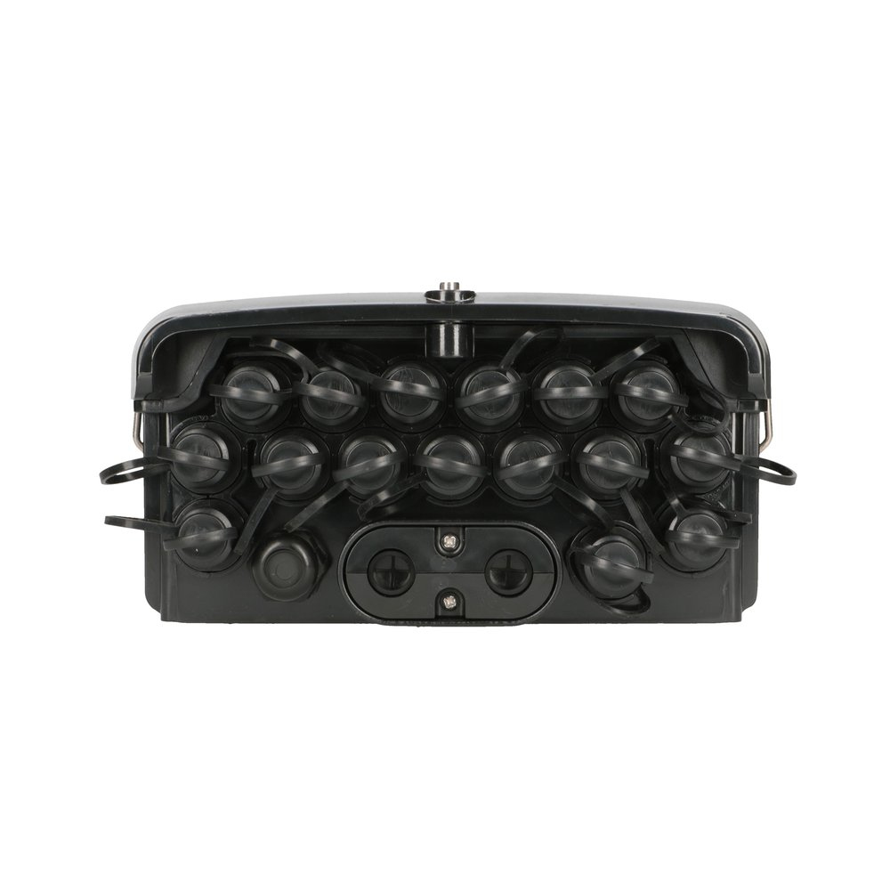 Czarne pudełko z wieloma czarnymi okrągłymi elementami. Białe tło.