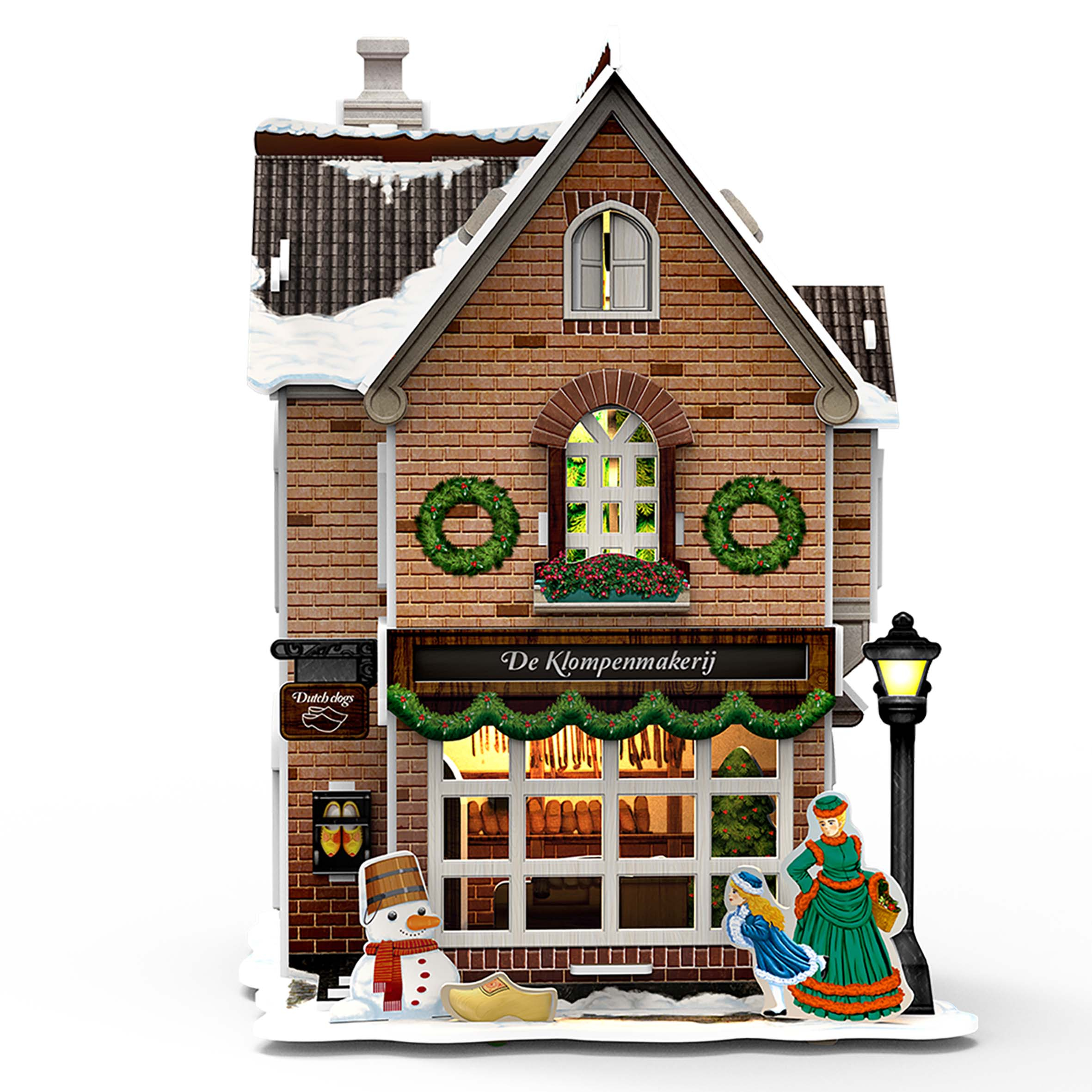 Un puzzle 3D di una casa olandese con decorazioni e figure natalizie.