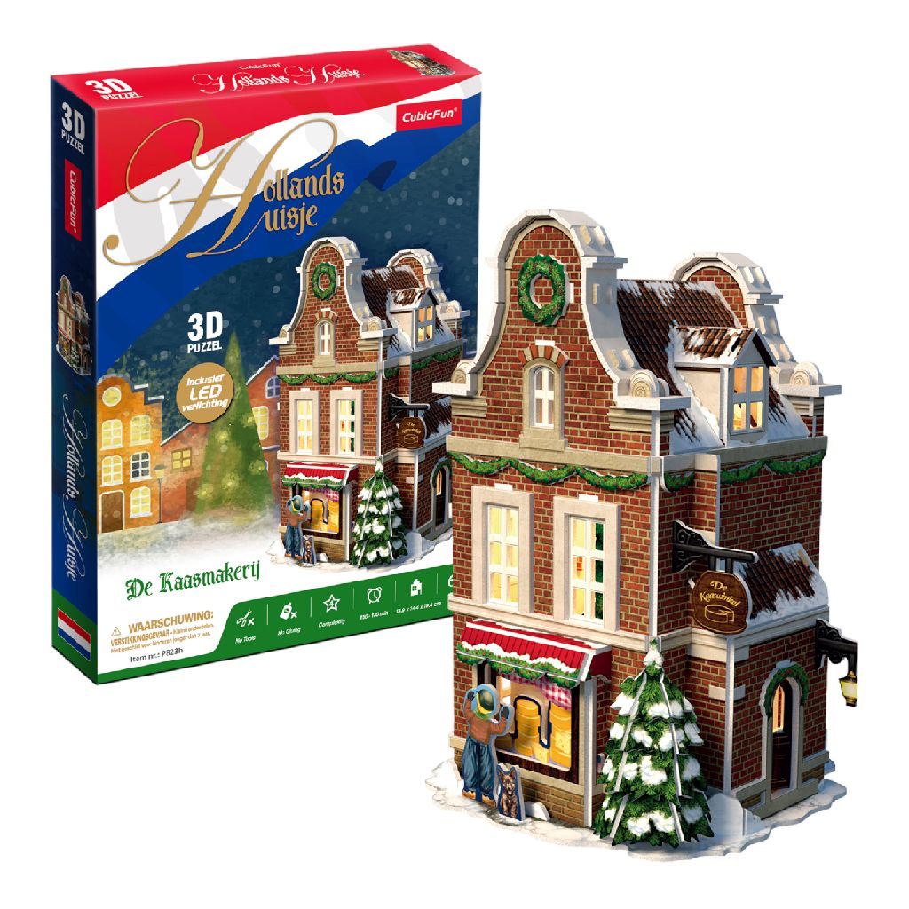 Puzzle 3D di una casa olandese con scatola e scritta 'De Kaasmakerij'.