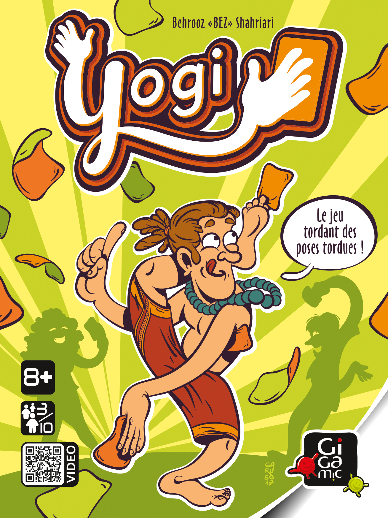 Pudełko gry planszowej "Yogi". Przedstawia karykaturę osoby wykonującej pozycje jogi, z tekstem.