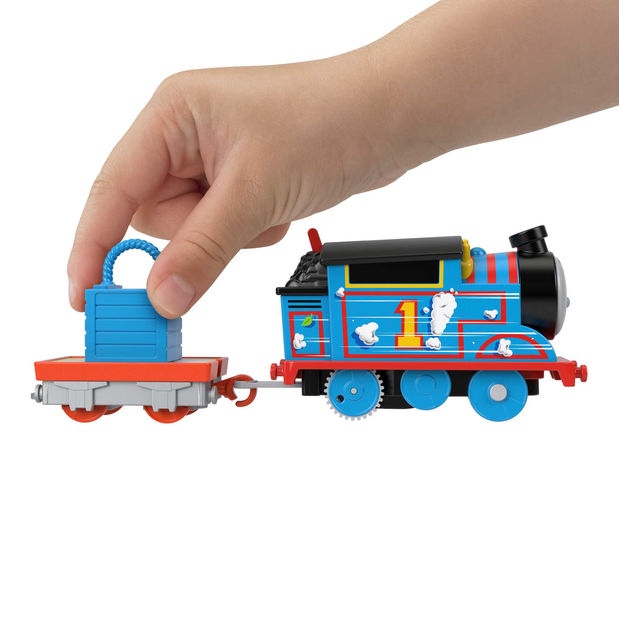 Thomas die Tank Engine zieht einen Wagen mit blauen Blöcken. Eine Hand hält den Wagen.