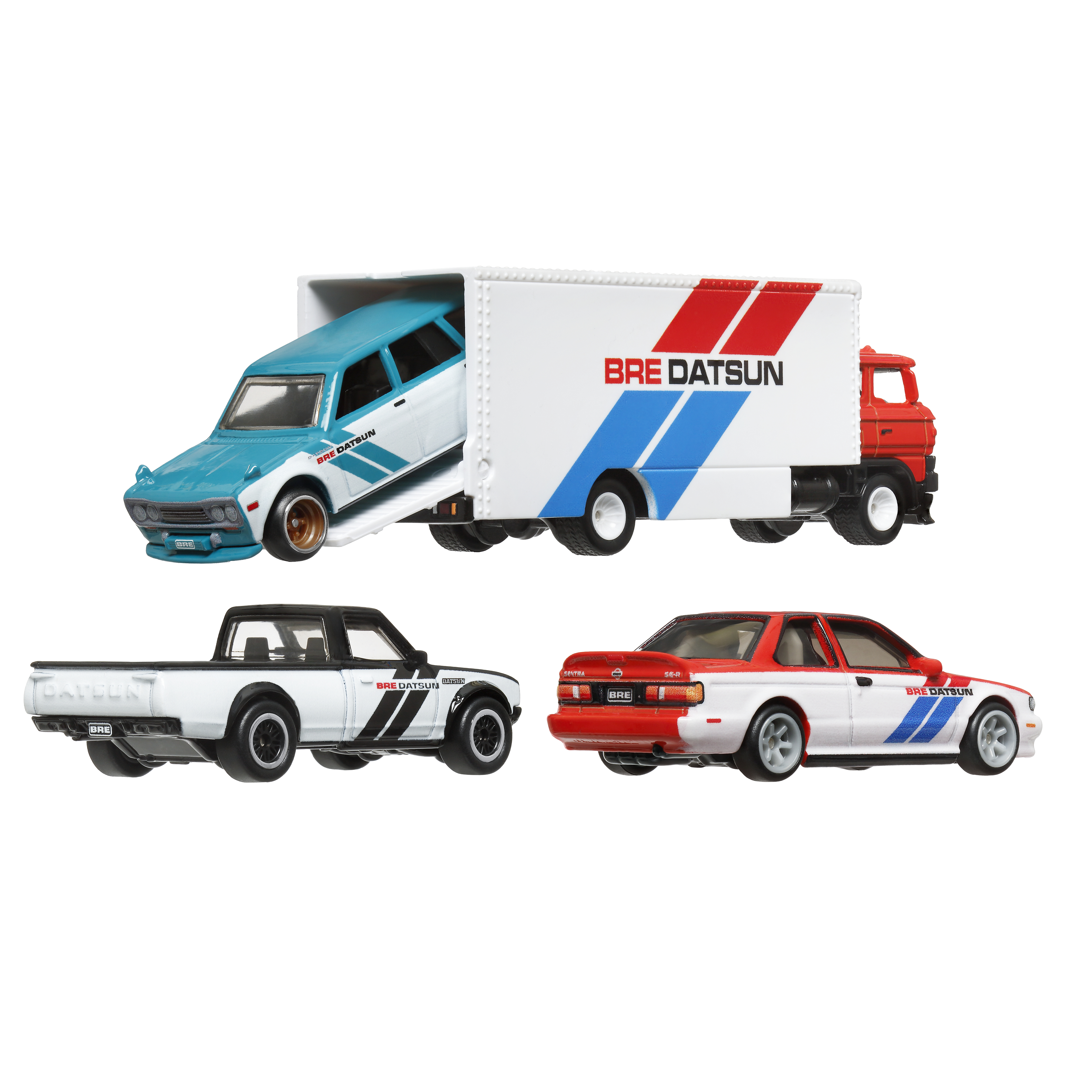 Tres coches de juguete: un camión, un camión blanco con "BRE DATSUN" y una camioneta blanca.