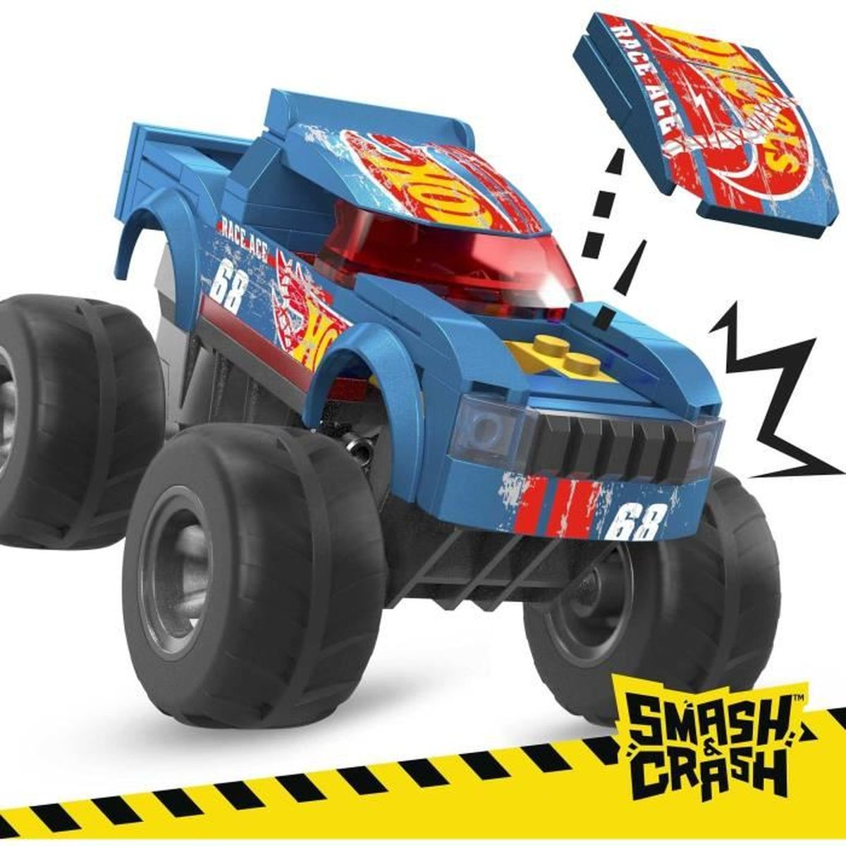 Un monster truck giocattolo blu con dettagli rossi e gialli e una carta staccata.