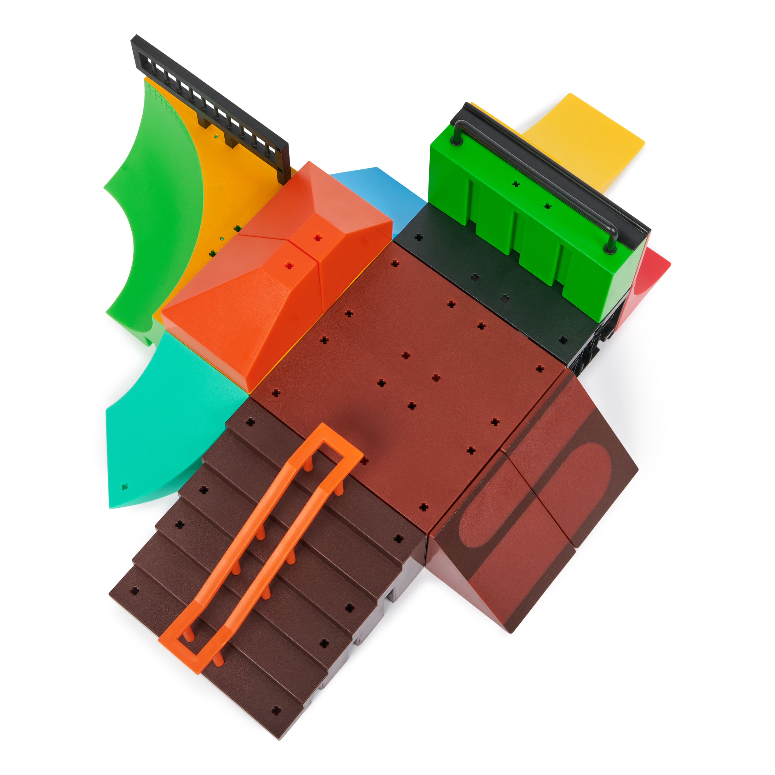 Wielokolorowy zestaw do skateboardingu z rampami i schodami.