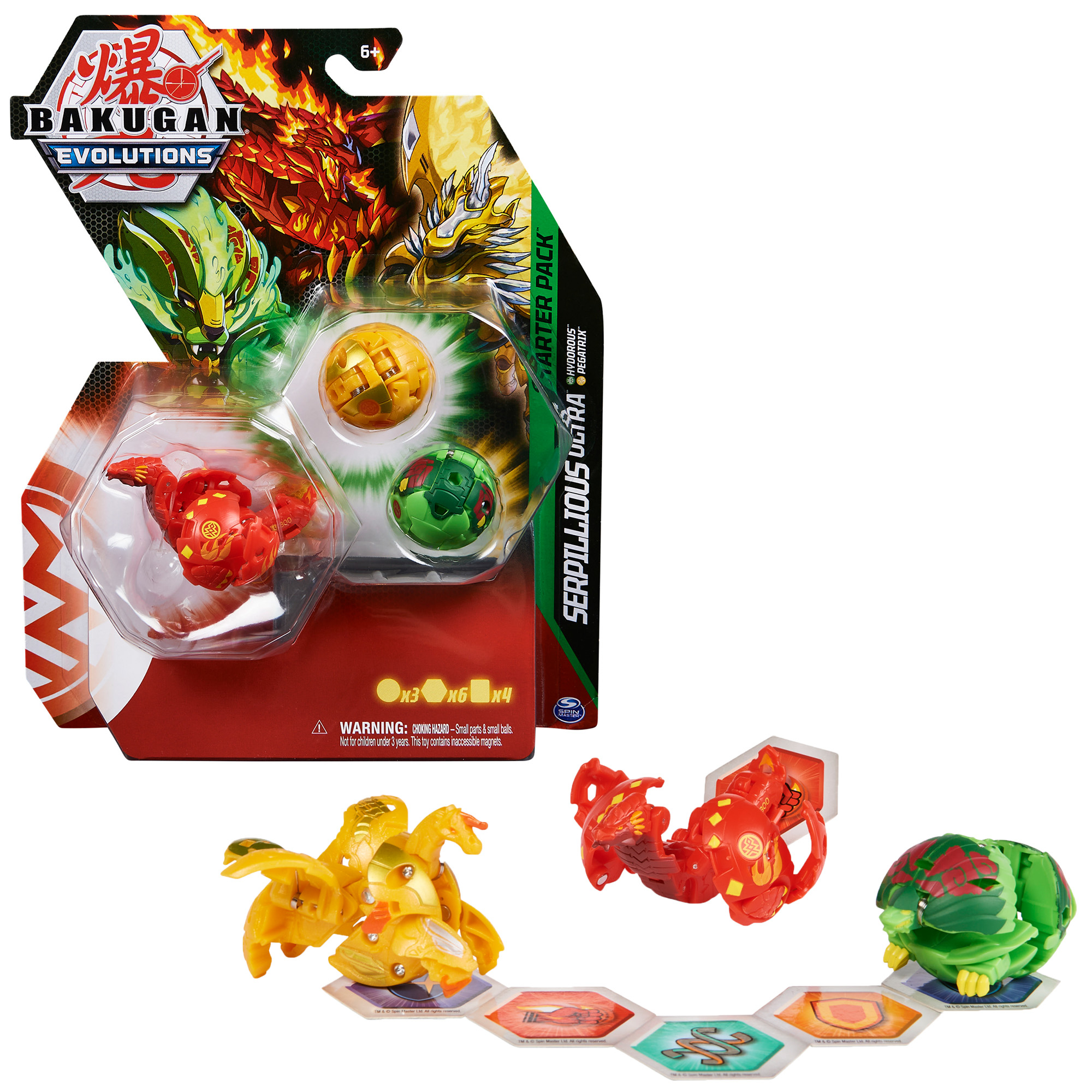 Zestaw startowy Bakugan Evolutions z kulami Bakugan, figurkami i sześciokątnymi kartami na białej powierzchni.