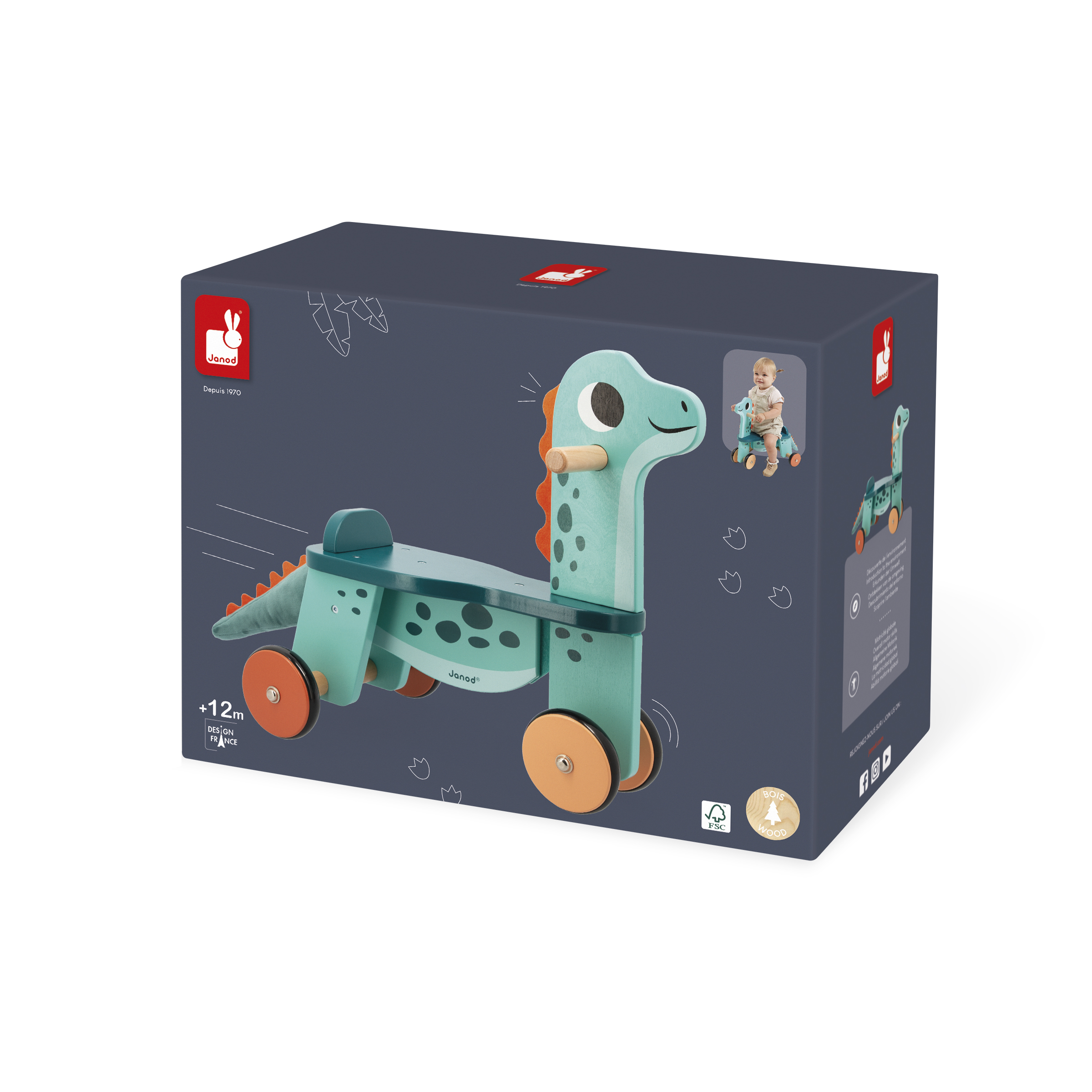 Janod Dinosaurier-Reittier. Grün mit orangefarbenen Rädern, einem Holzgriff. Verpackt in einer Box.