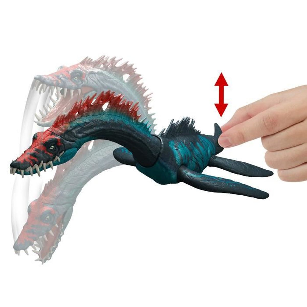 Juguete de dinosaurio en movimiento. Una mano mueve el juguete, mostrando una mandíbula articulada y diseño colorido.