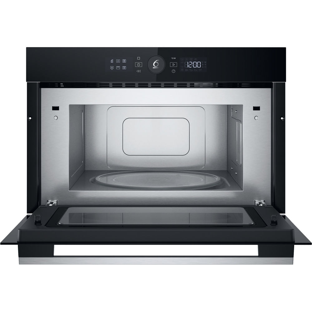Un forno a microonde nero ad incasso con la porta aperta, che rivela l'interno. Ha un display digitale e un pannello di controllo.
