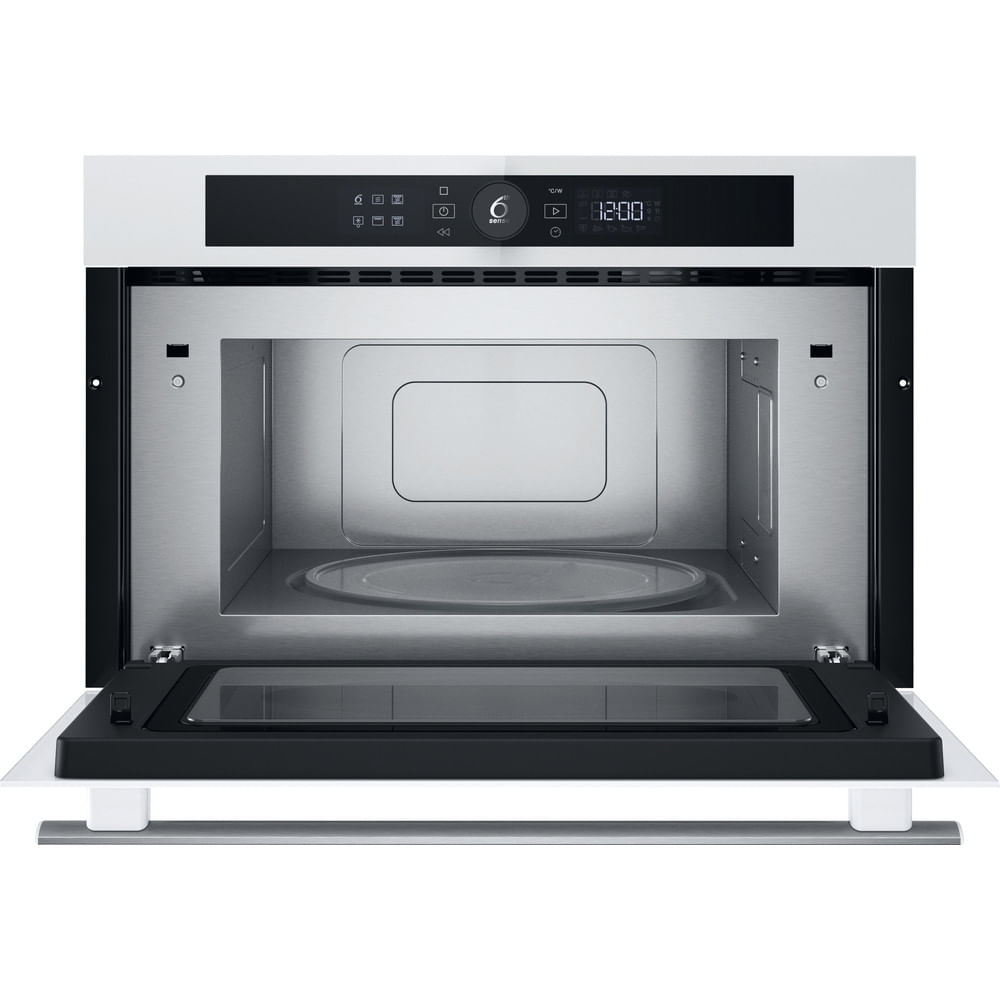 Forno a microonde con porta aperta. Interno e pannello di controllo visibili.