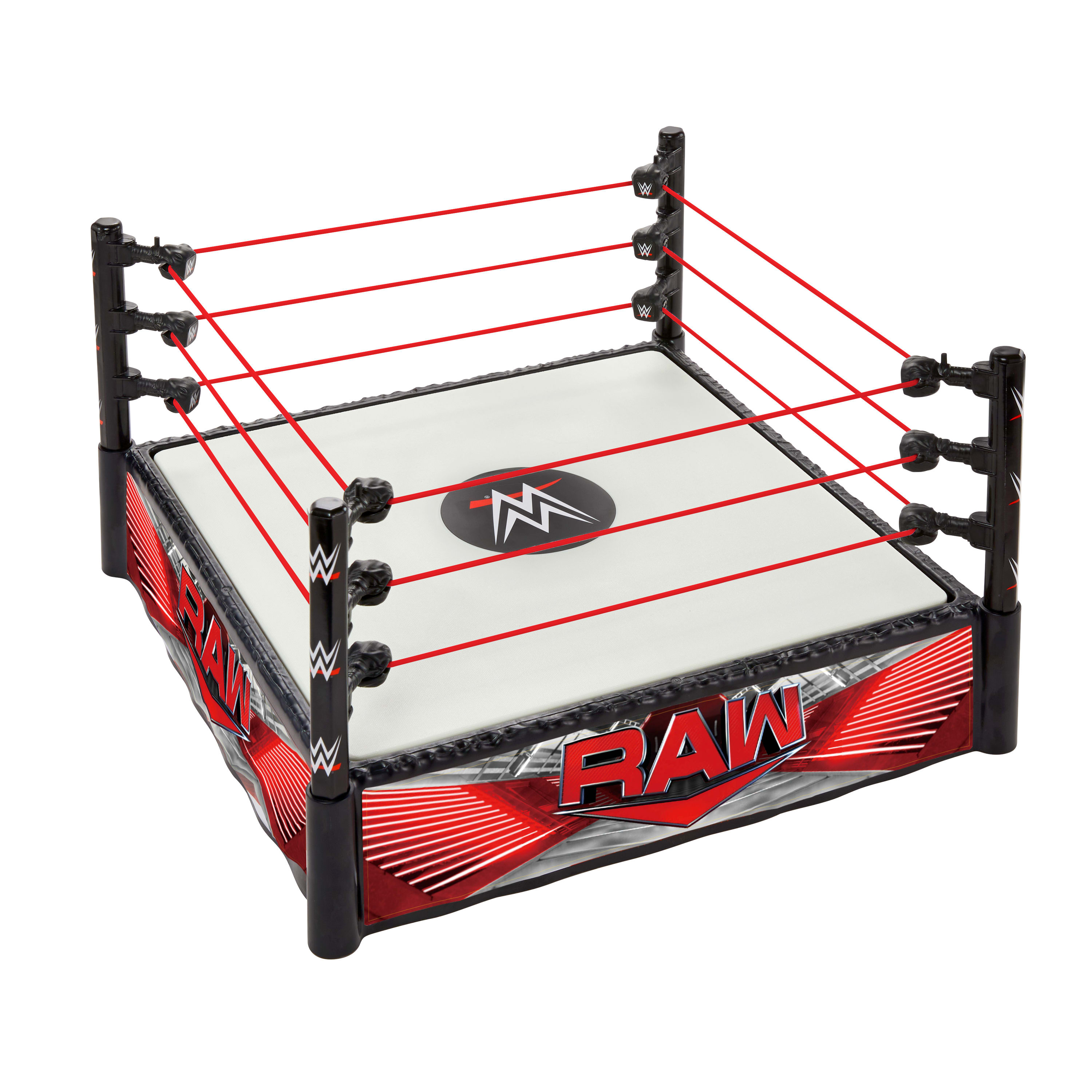 Zabawkowy ring wrestlingowy z czerwonymi linami, czarnymi słupkami i białą matą z logo, na białym tle.