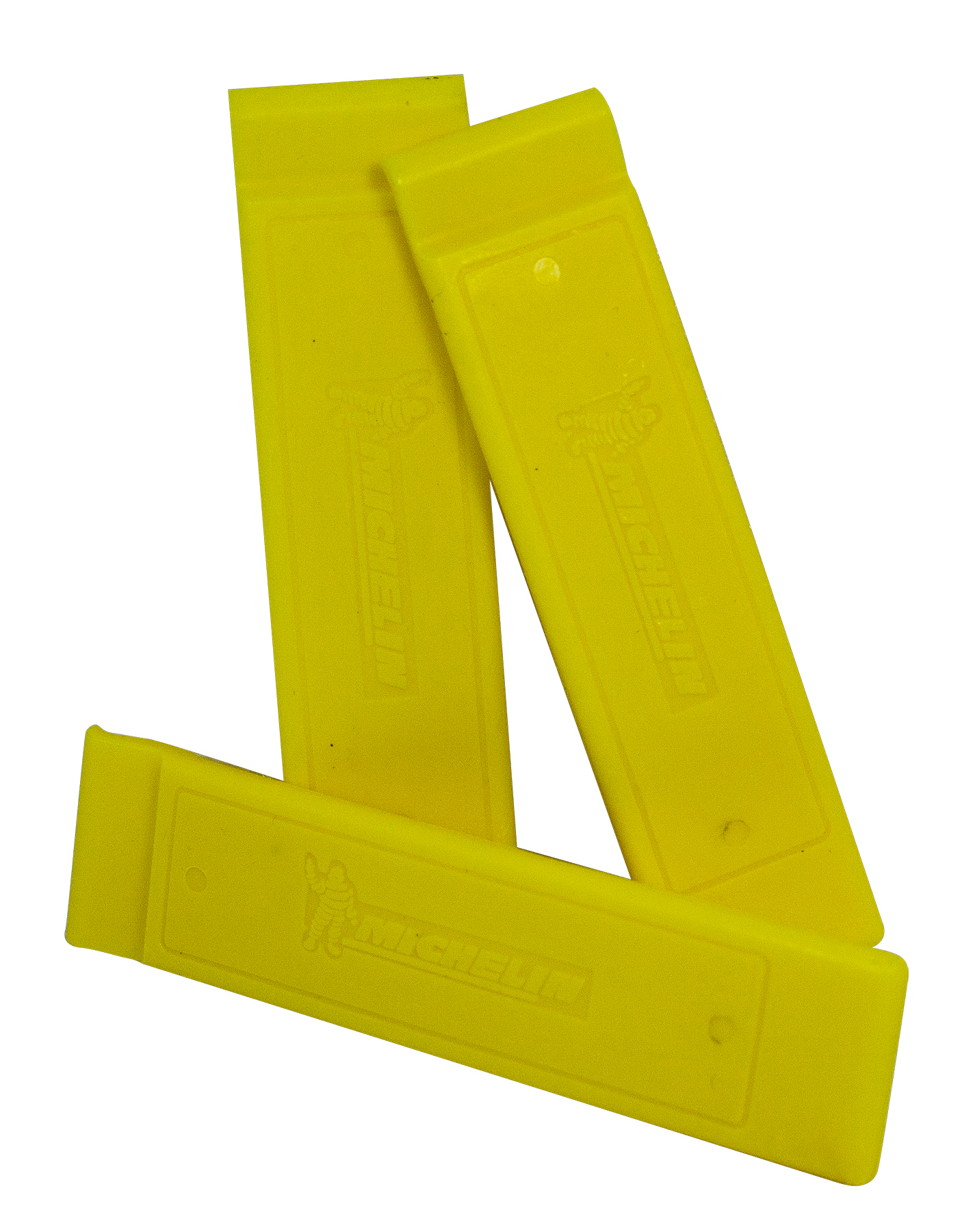 Żółte kliny do opon z logo Michelin. Trzy kliny ułożone na białym tle.