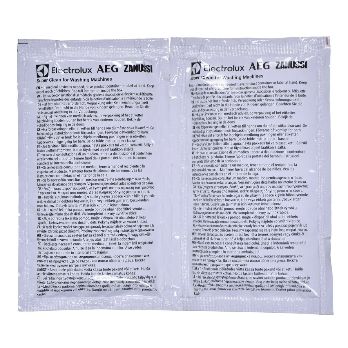 Dwie białe paczki detergentu z tekstem w wielu językach.