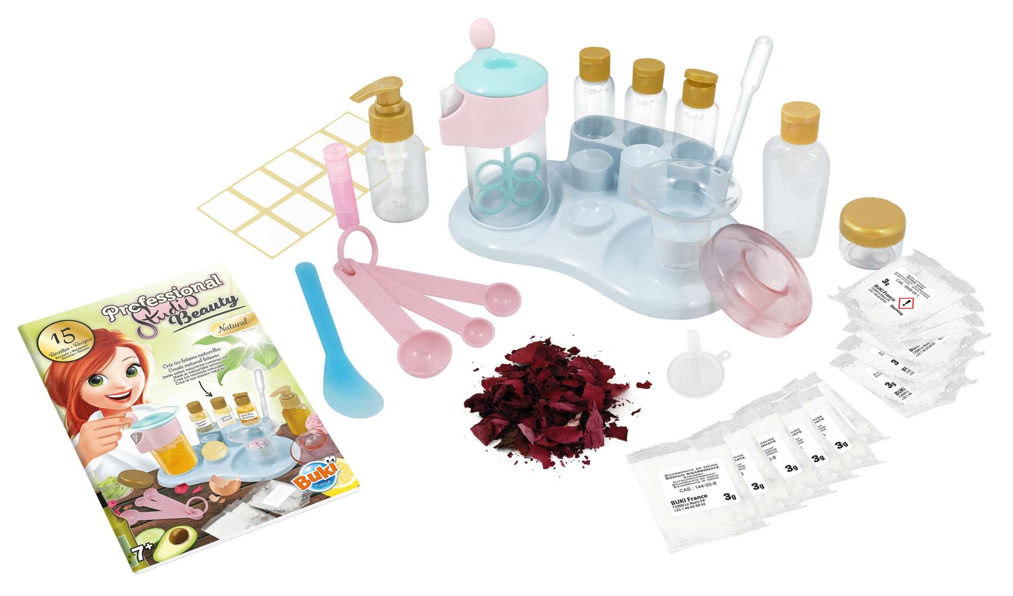 Spielzeug-Beauty-Studio-Set mit verschiedenen Werkzeugen, darunter Flaschen, Messlöffel und Anweisungen, auf weißer Oberfläche.