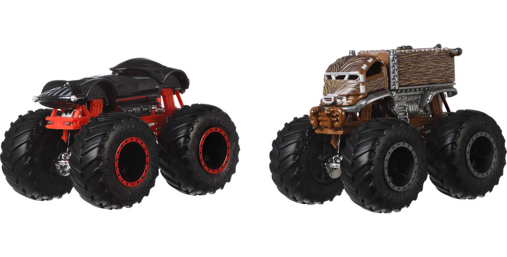 Dwa monster trucki. Jeden czarny, drugi brązowy z twarzą Chewbaccy. Czarne koła, czerwone felgi.