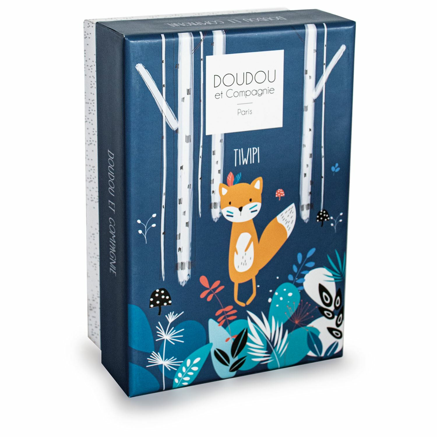 Niebieskie pudełko z motywem lisa i drzew. Pudełko ma białą etykietę z tekstem.