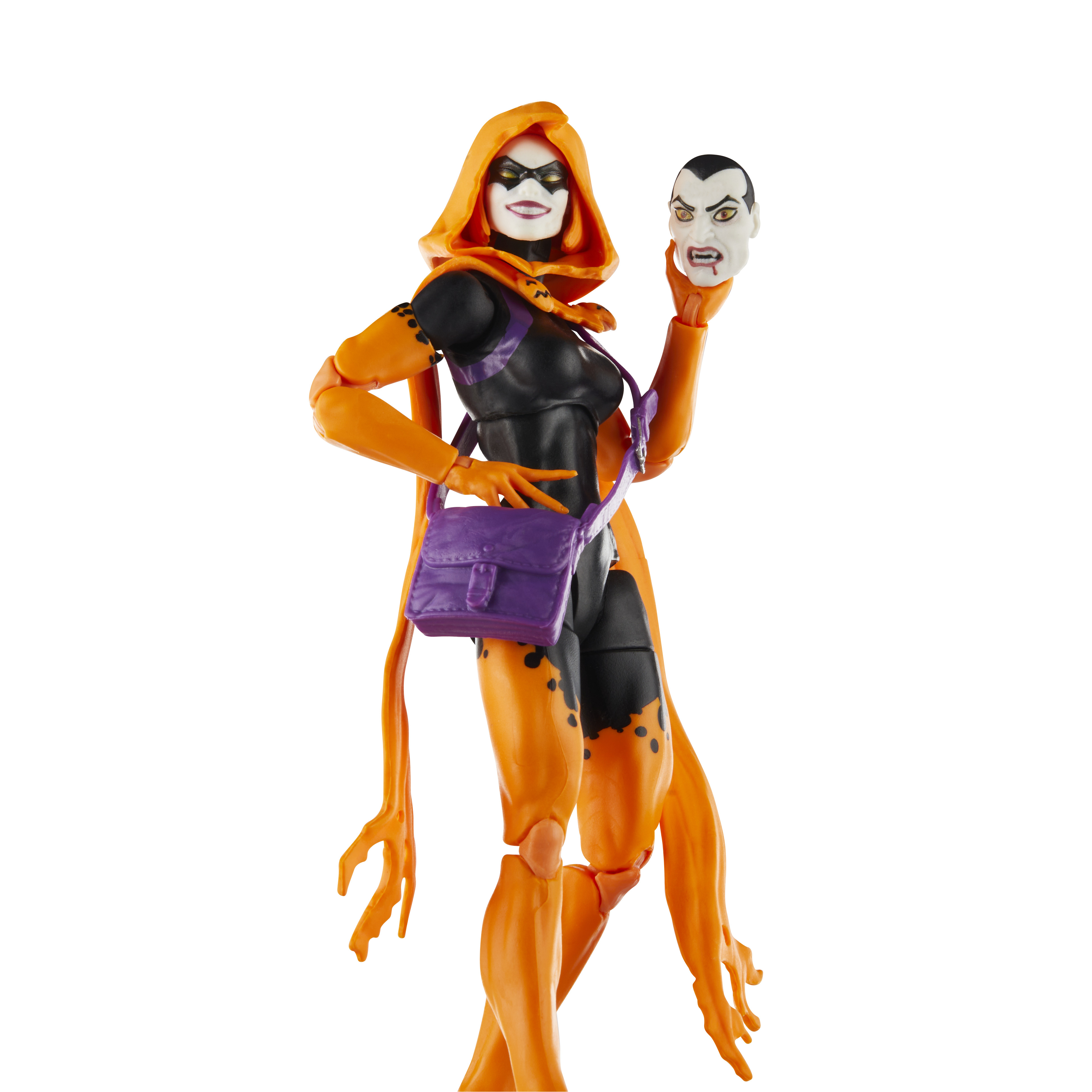 Una figura giocattolo con un mantello con cappuccio arancione, maschera e una testa di diavolo. Schema di colori nero e arancione.