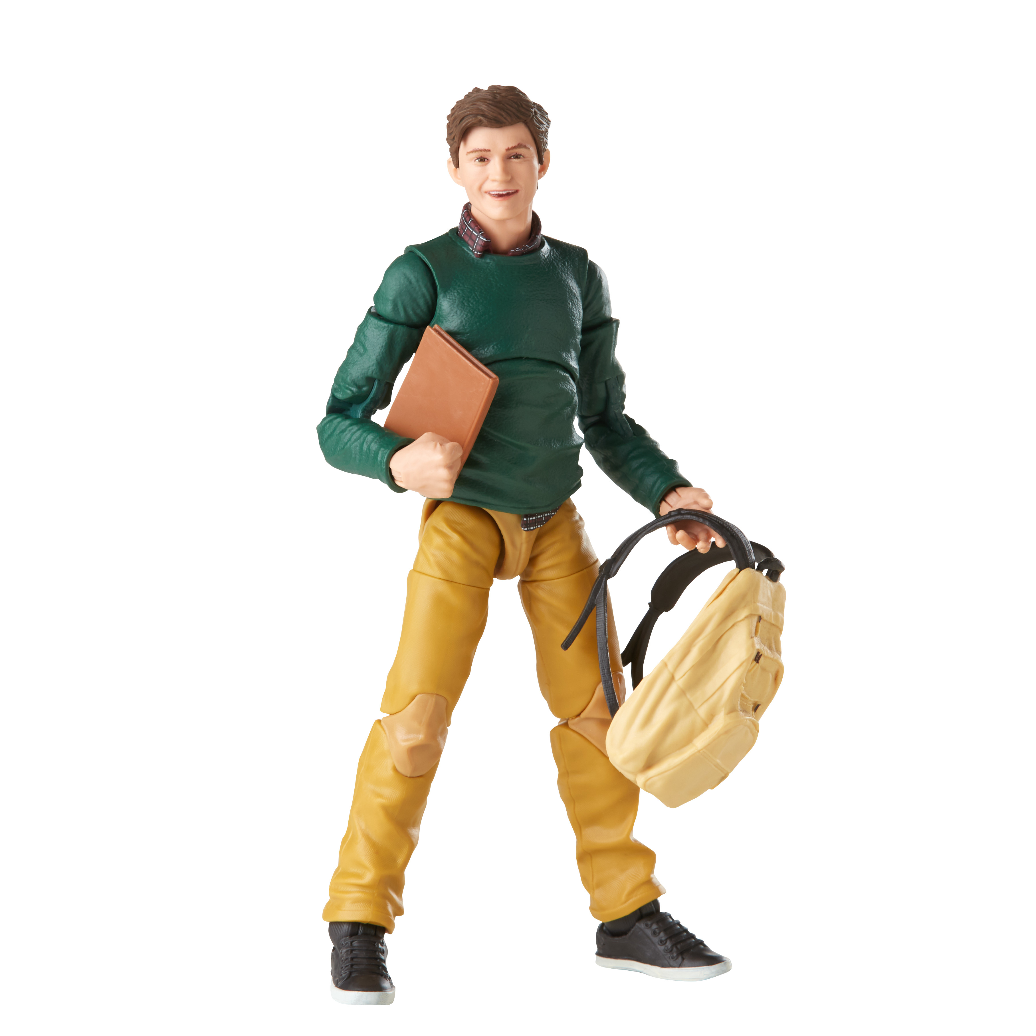 Una figura de juguete de un niño con un suéter verde y un libro. Lleva una mochila.