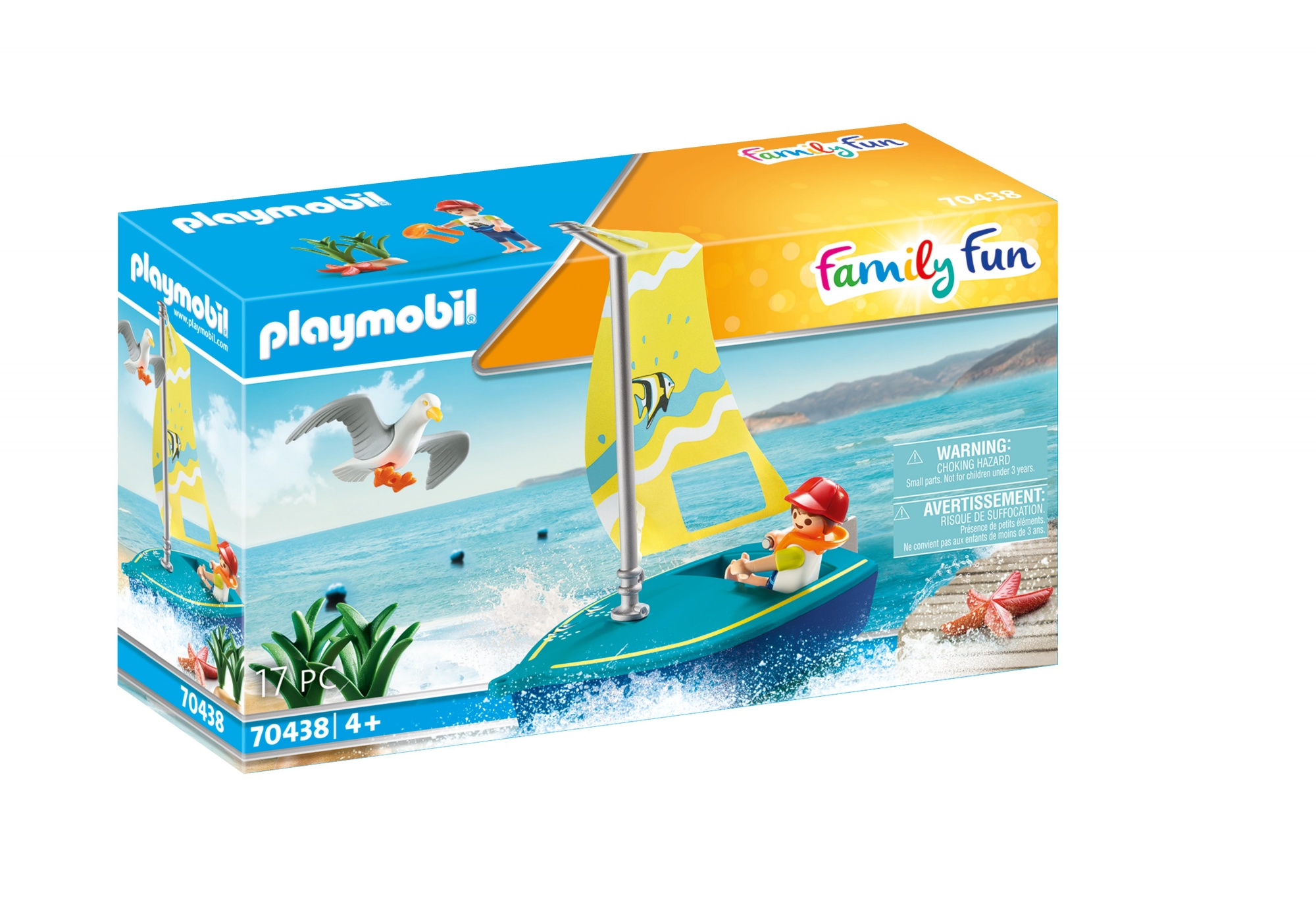 Set di giocattoli Playmobil. Una scatola con una barca a vela sul mare. Un gabbiano sta volando.