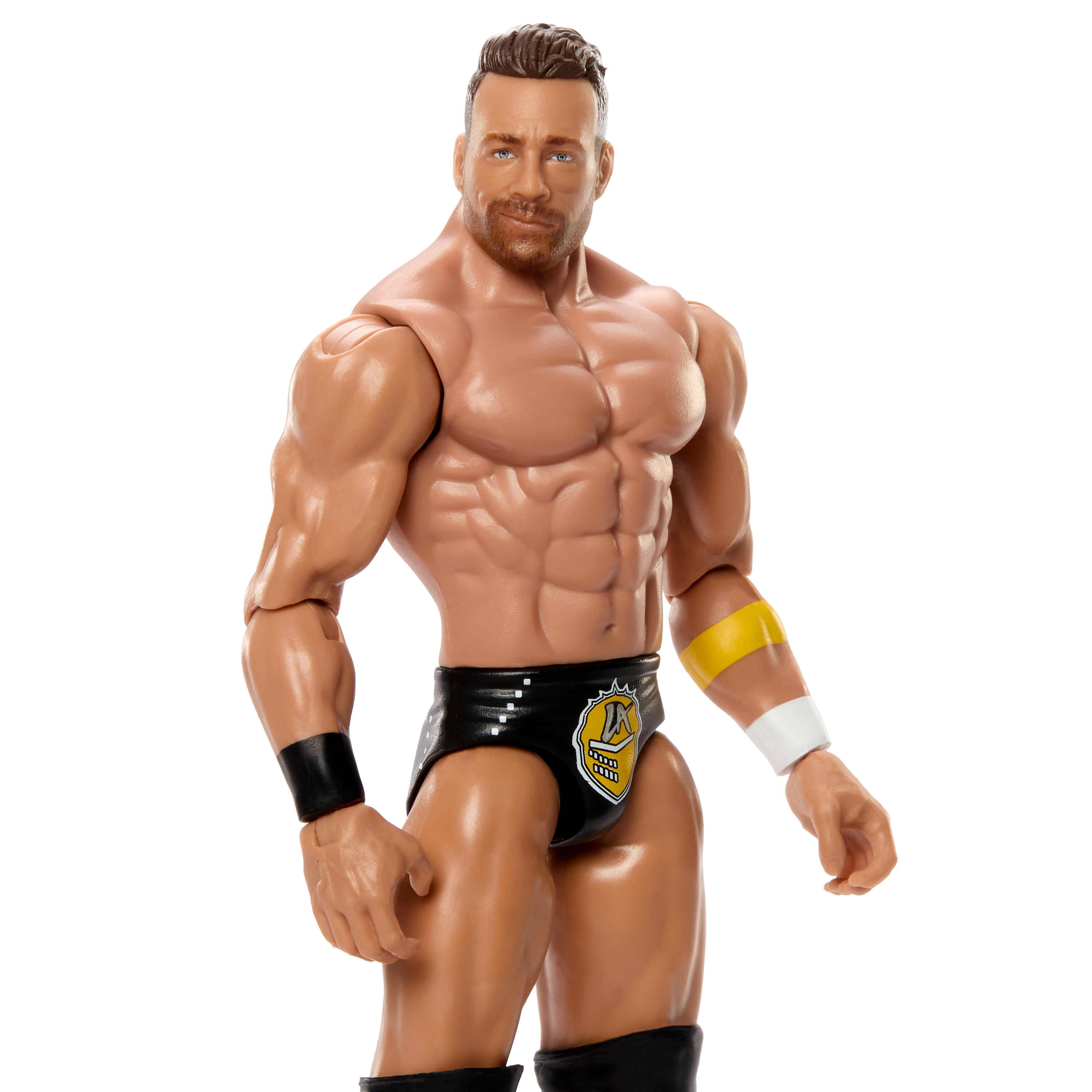 Actionfigur eines muskulösen Mannes in Wrestling-Kleidung. Weißer Hintergrund.