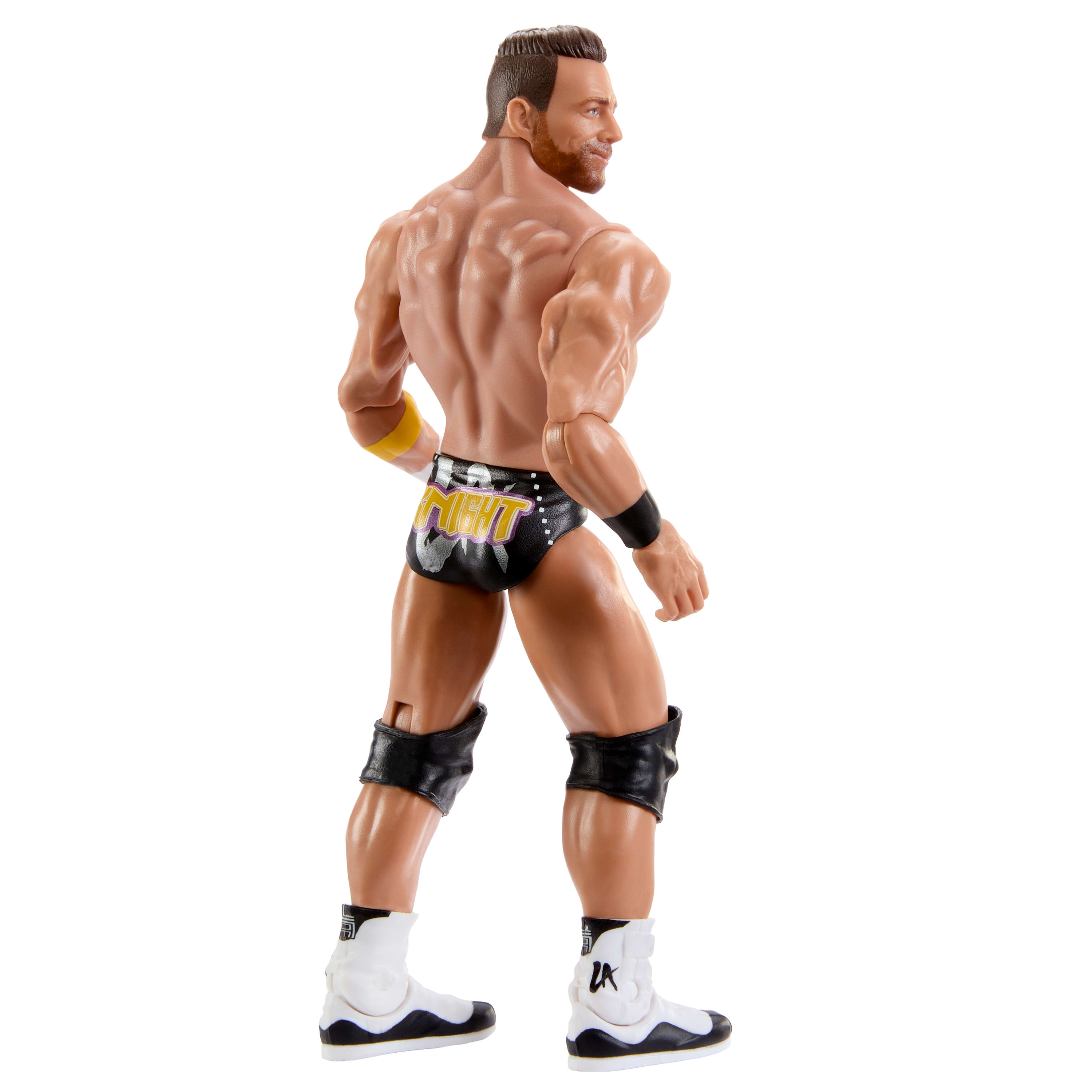 Spielzeugfigur eines Wrestlers, von hinten gesehen. Er trägt schwarze und gelbe Hosen und Stiefel.
