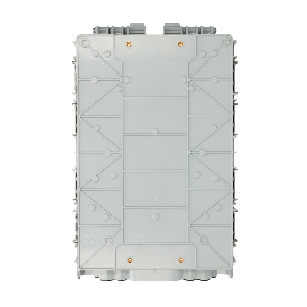 Jasnoszare prostokątne pudełko, widok z góry. Ma żebra i małe śruby po bokach. Białe tło.