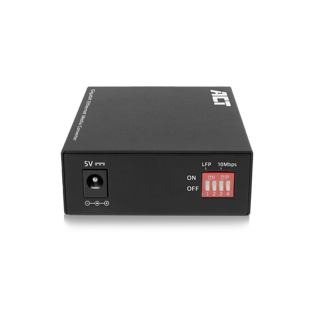 Czarny Gigabit Ethernet Media Converter z czerwonymi przełącznikami DIP i wejściem zasilania. Białe tło.