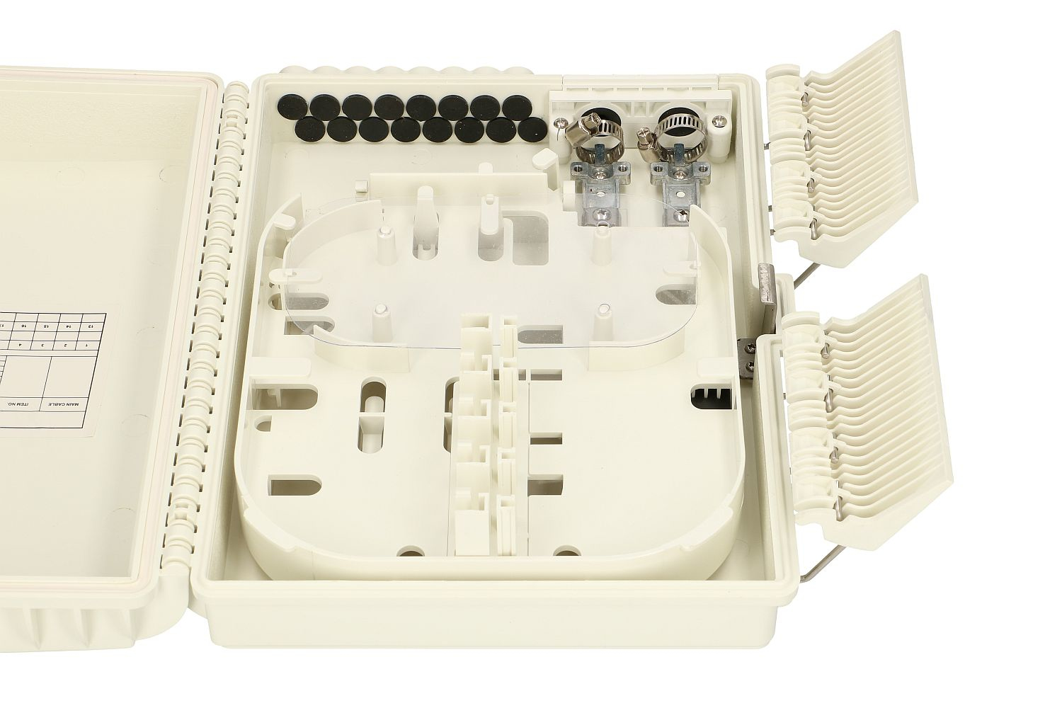Otwarta beżowa prostokątna skrzynka pokazująca wnętrze, w tym przezroczystą plastikową tacę i czarne gumowe elementy.