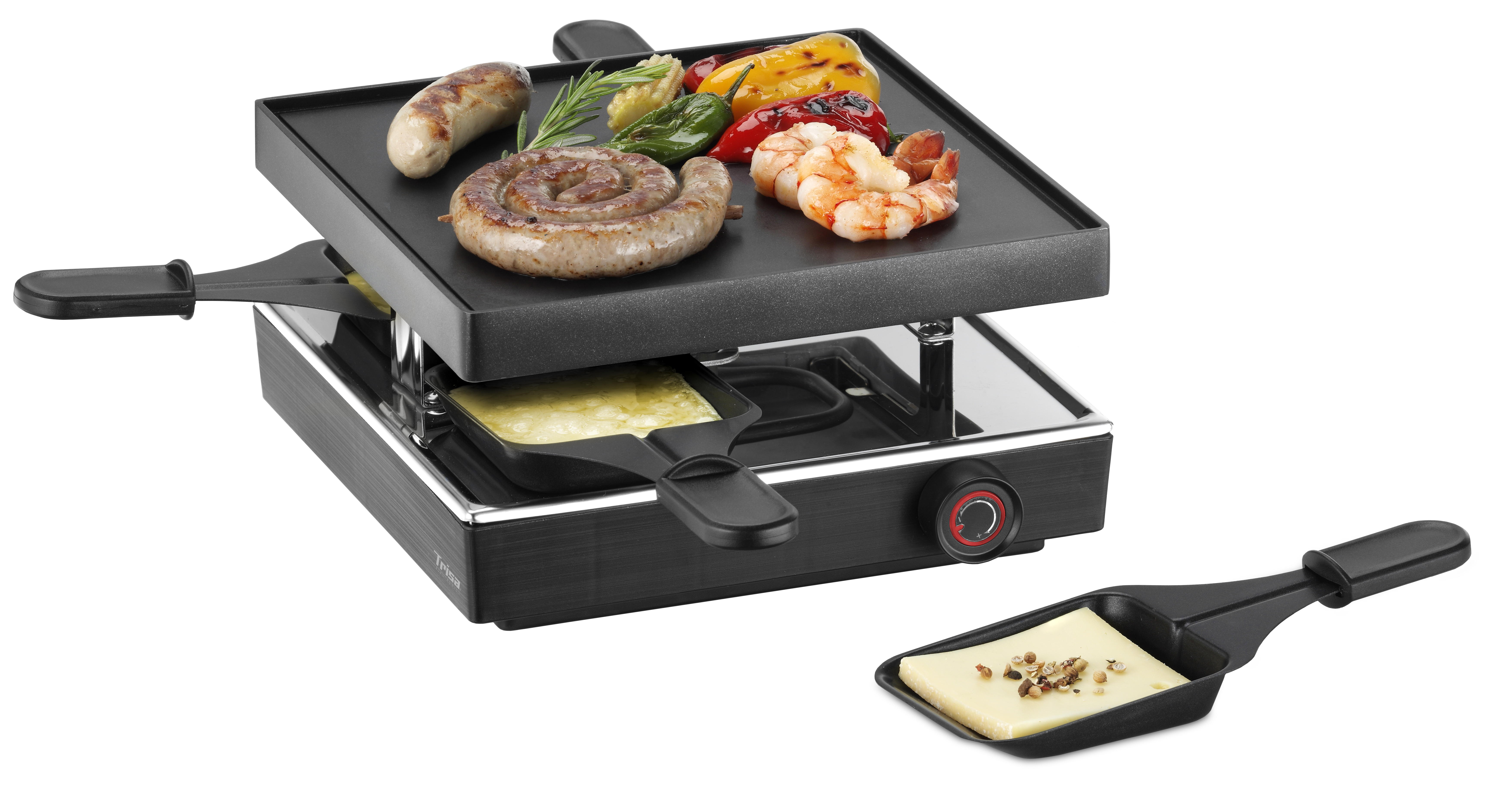 Raclette-Grill mit gekochter Wurst, Garnelen, Paprika und Käse.