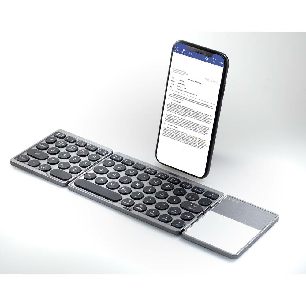 Tastiera pieghevole con uno smartphone che mostra un documento.
