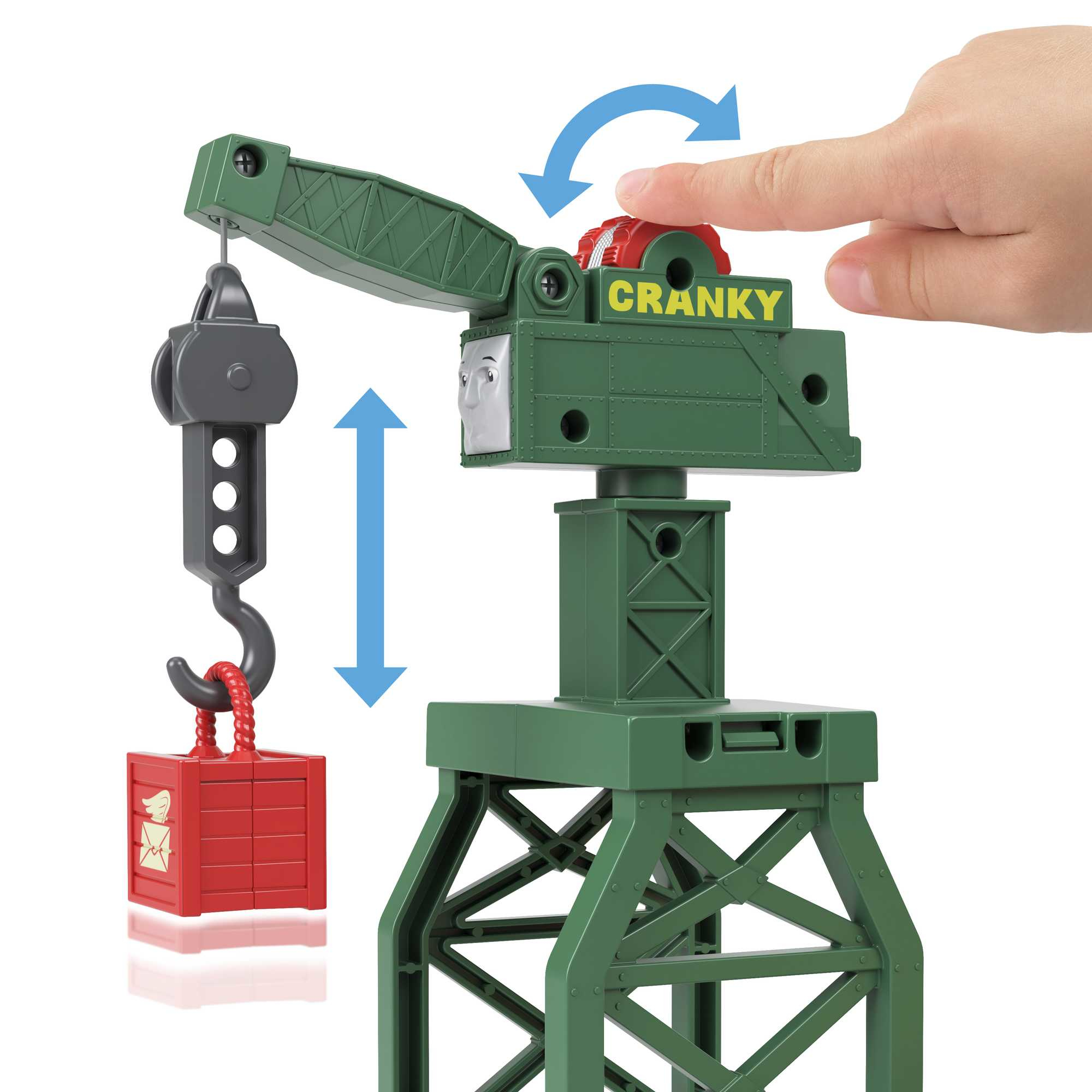 Ein grüner Cranky the Crane Spielzeugkran mit roter Hakenschachtel, die von einer Hand gehoben wird.