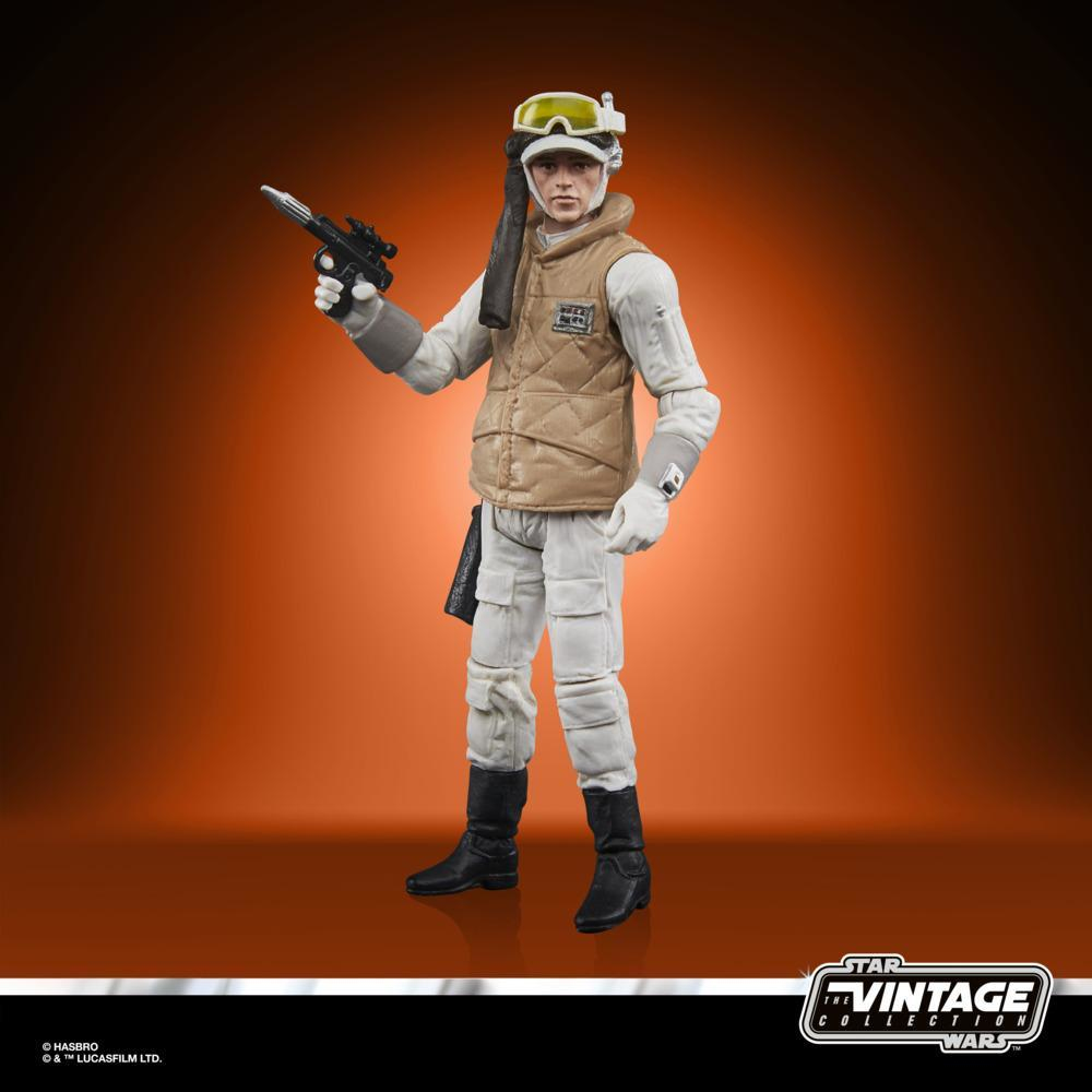 Action figure di Star Wars di un uomo in bianco e beige, con una pistola.