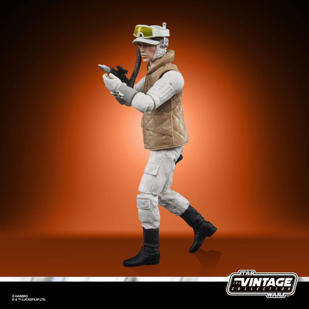 Una action figure di Star Wars di una soldatessa ribelle, che mira un'arma, su sfondo arancione.