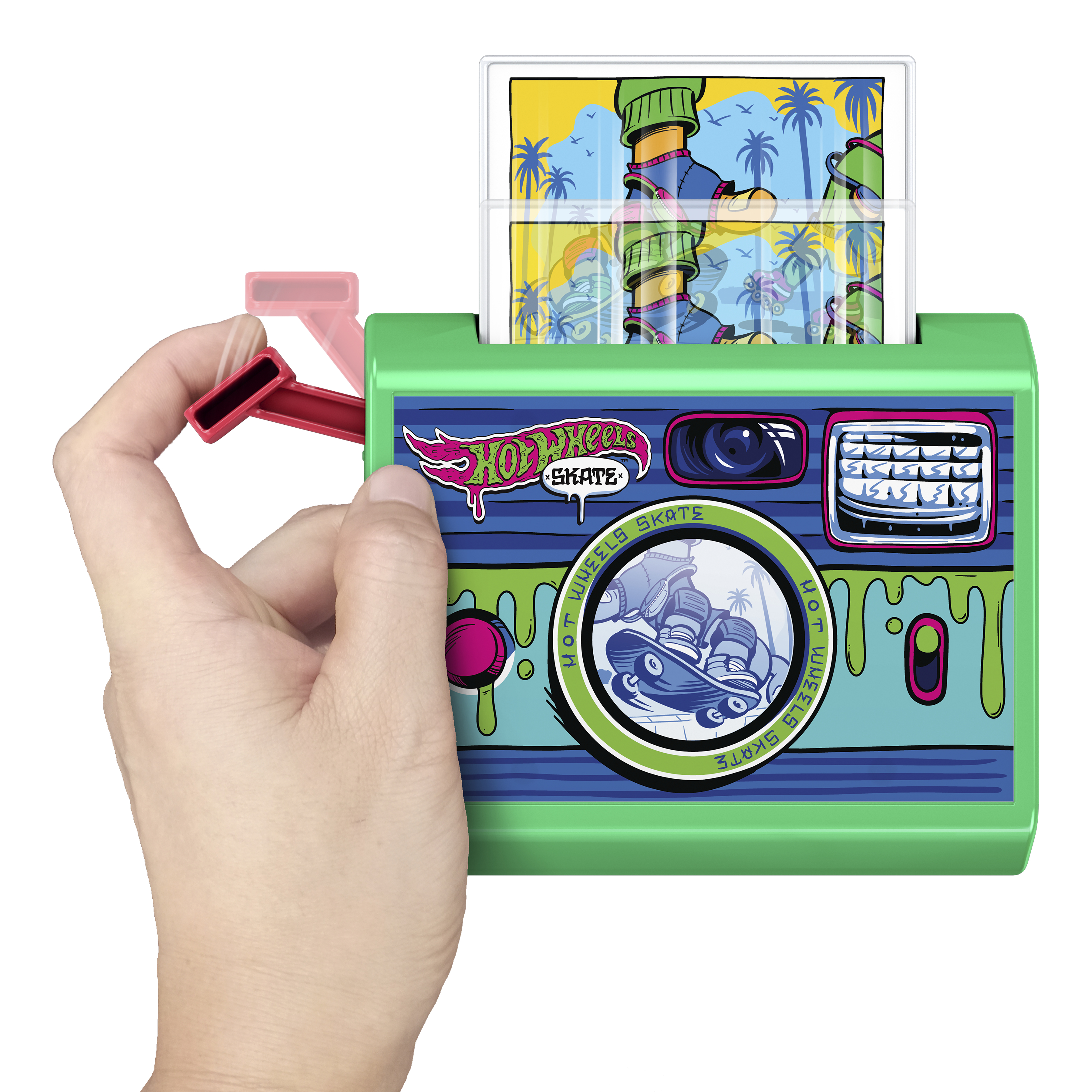 Ręka osoby używa zabawki Hot Wheels skate, wkładając kartę z ilustracjami. Zabawka jest zielona.