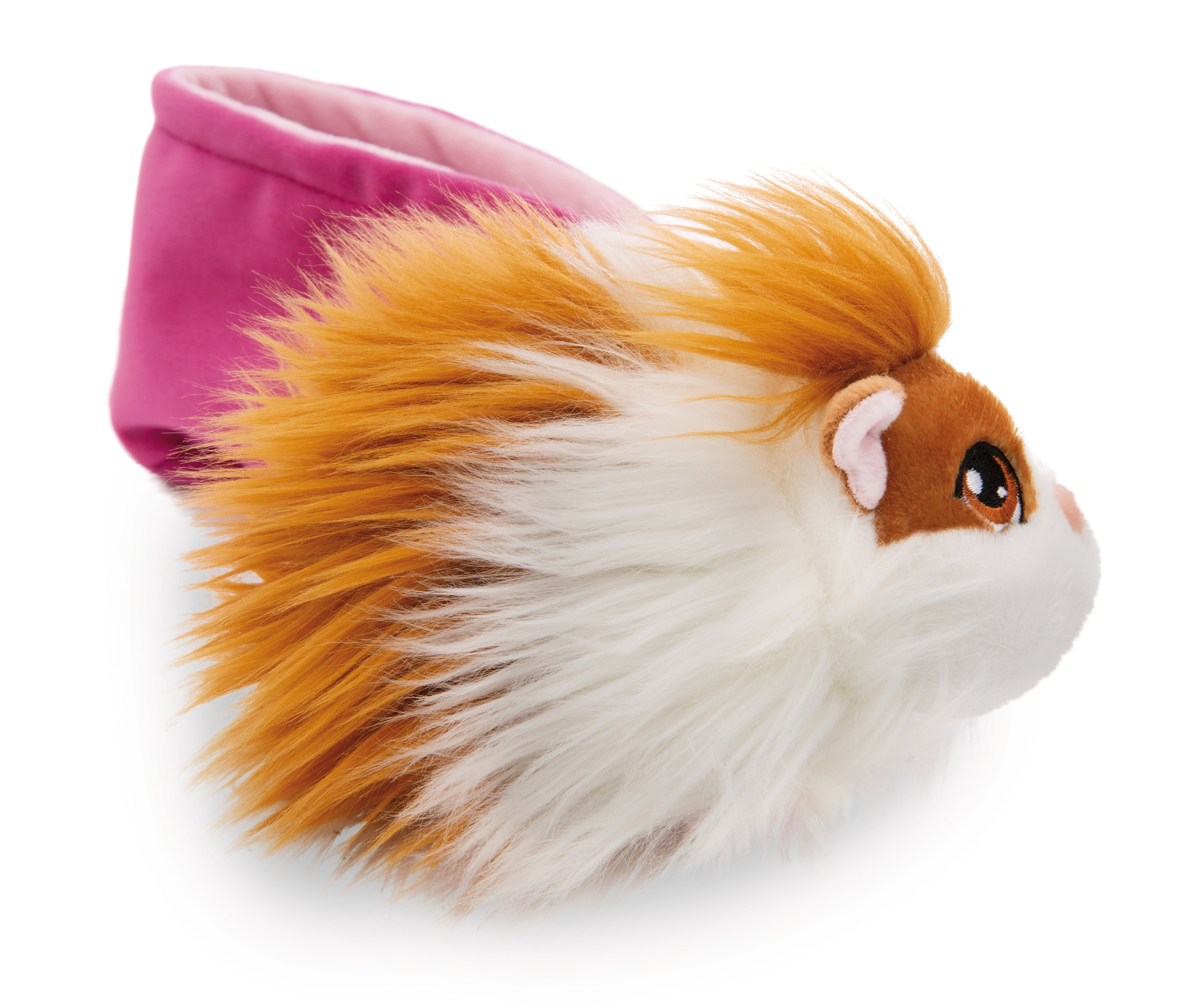 Ein Stoffmeerschweinchen-Spielzeug mit orangefarbenem, weißem und braunem Fell, mit einem rosa Bett.