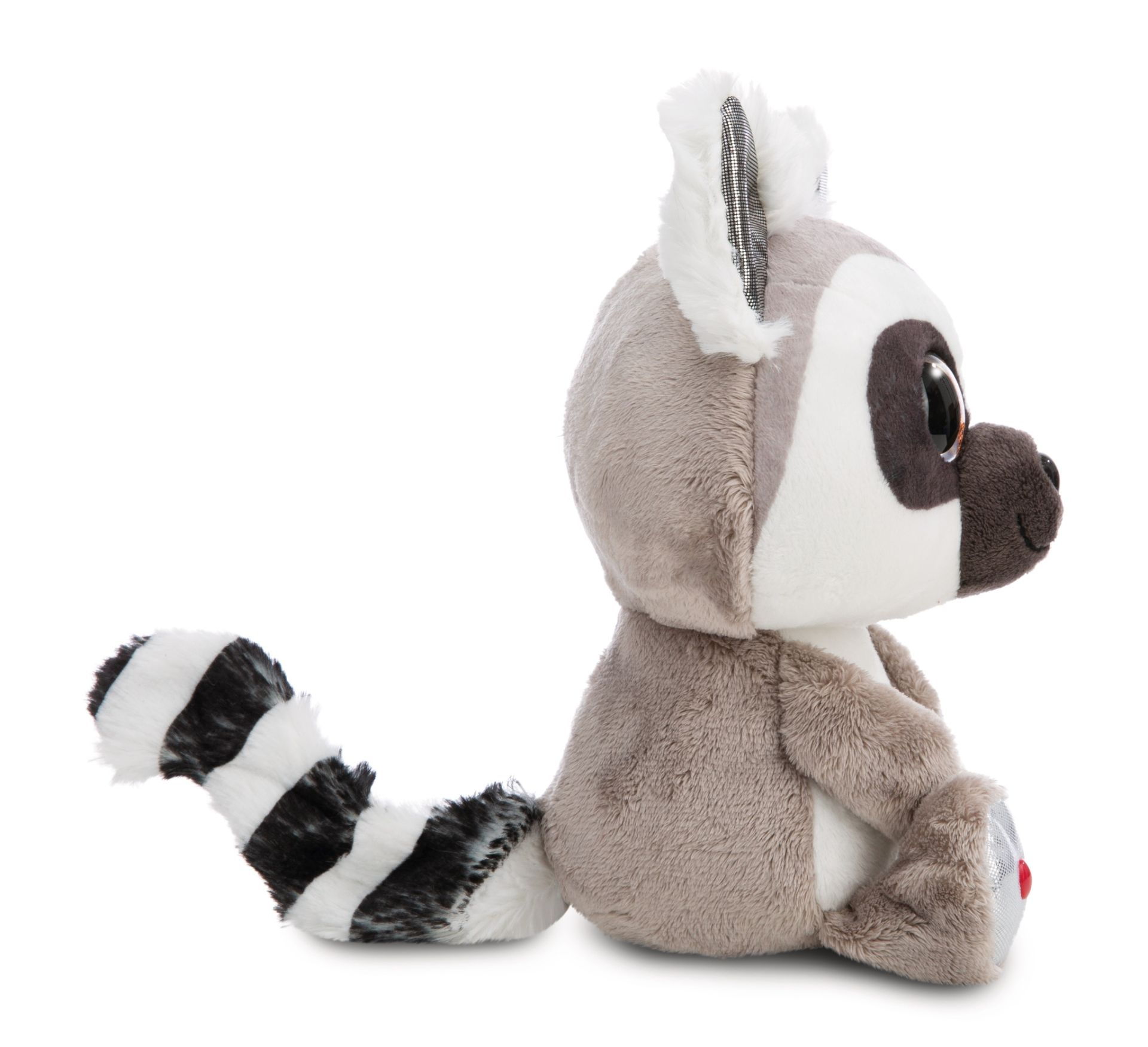 Ein Stofftier-Lemur, graues und weißes Fell, sitzt auf einer weißen Oberfläche. Hat große Augen.