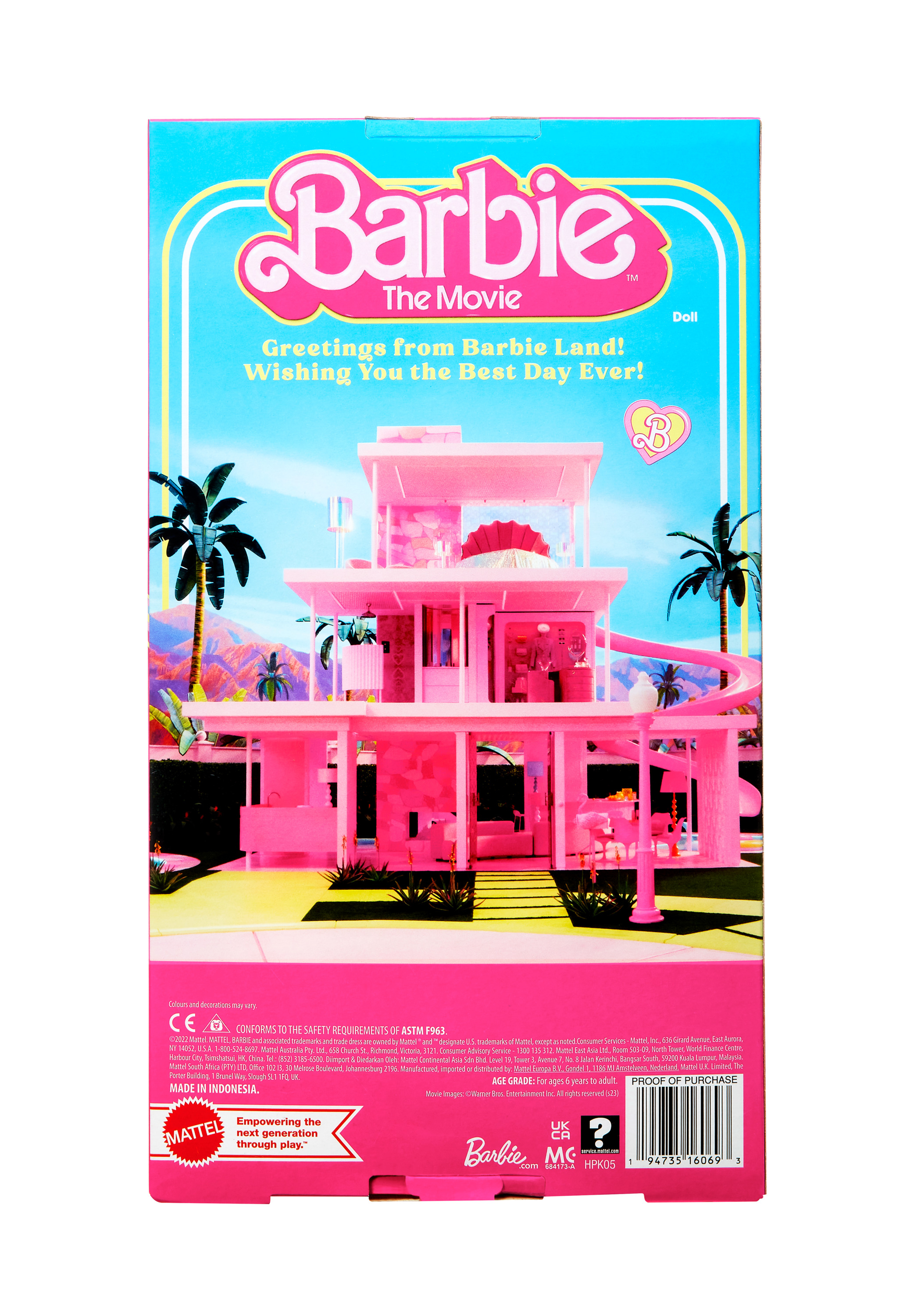 Rückseite einer Barbie-Film-Puppenbox. Sie zeigt ein pinkfarbenes Barbie-Traumhaus mit Palmen und blauem Himmel.