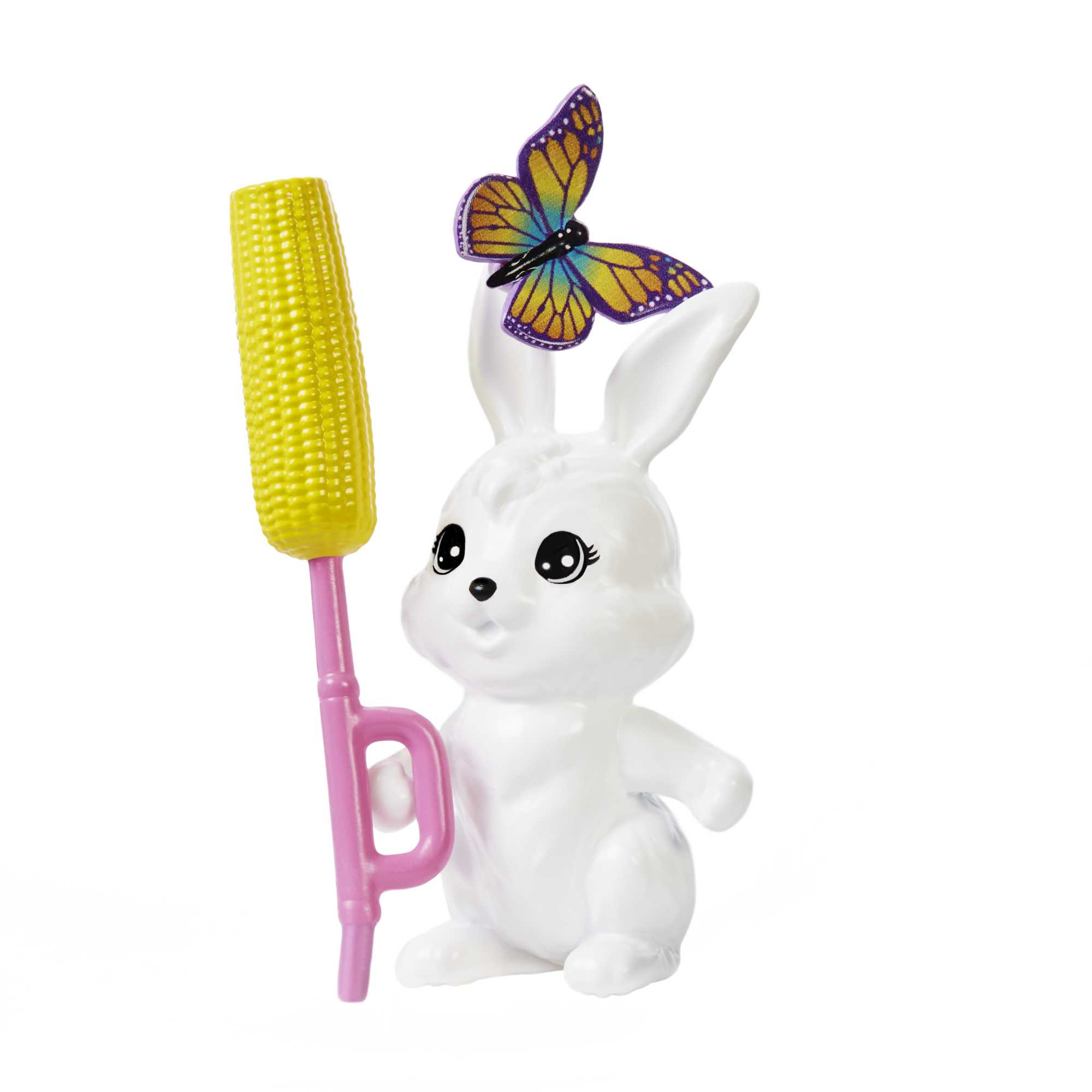Biały królik zabawka z motylem i kolbą kukurydzy, na białym tle.