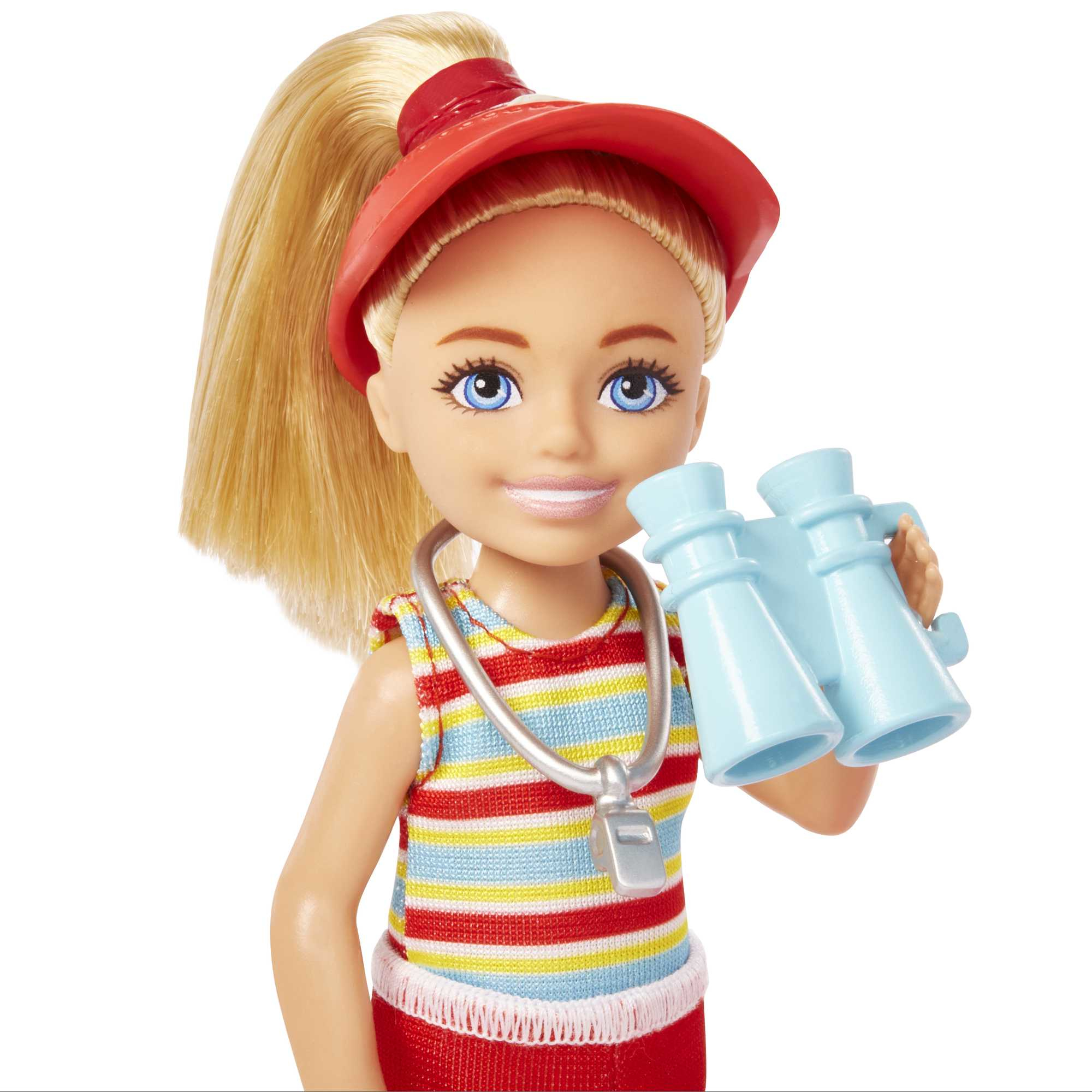 Eine Puppe mit blondem Haar, die ein rotes Visier trägt und ein Fernglas hält.