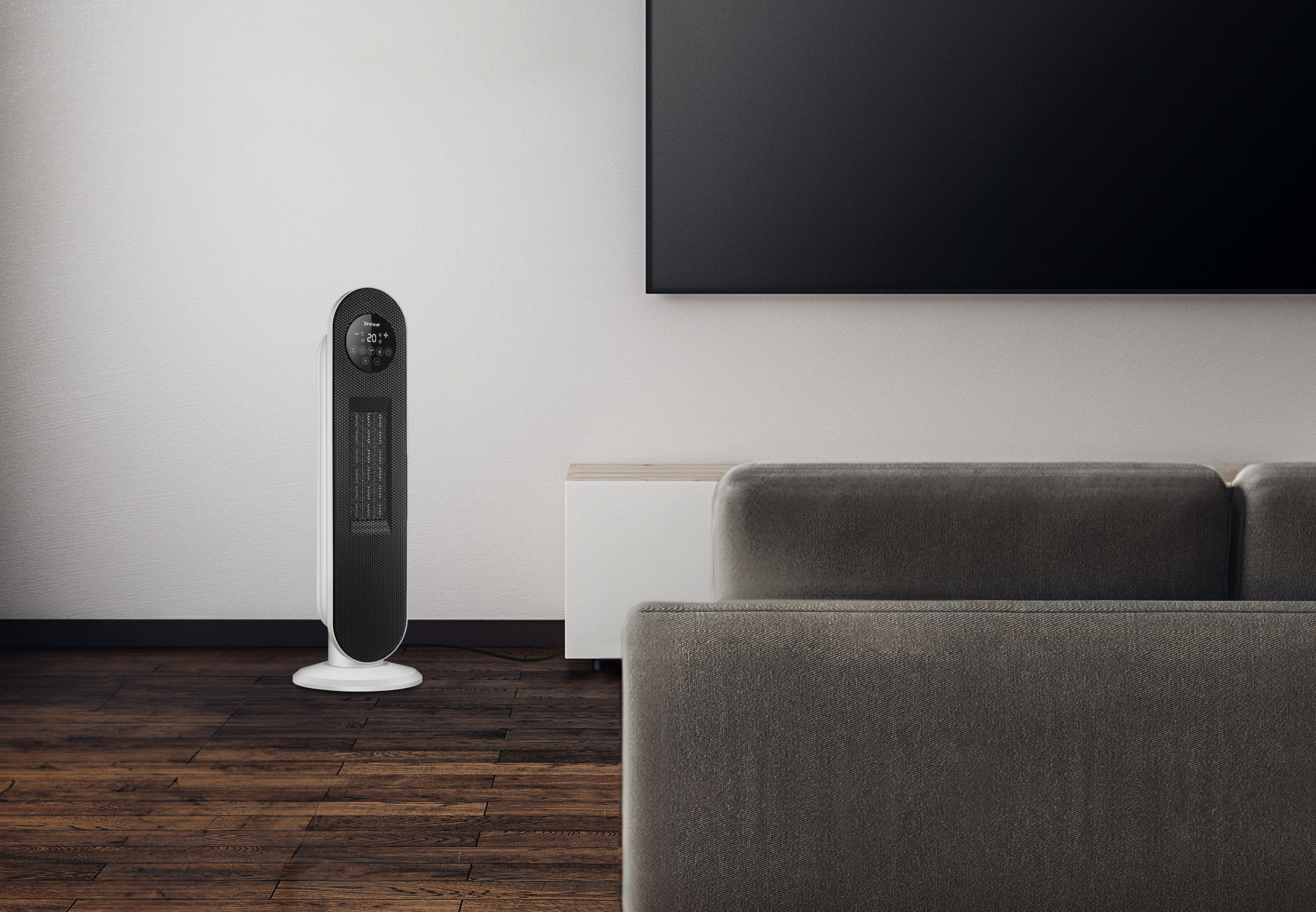 Weißer Elektroheizer in einem Wohnzimmer, mit Sofa und Fernseher im Hintergrund.