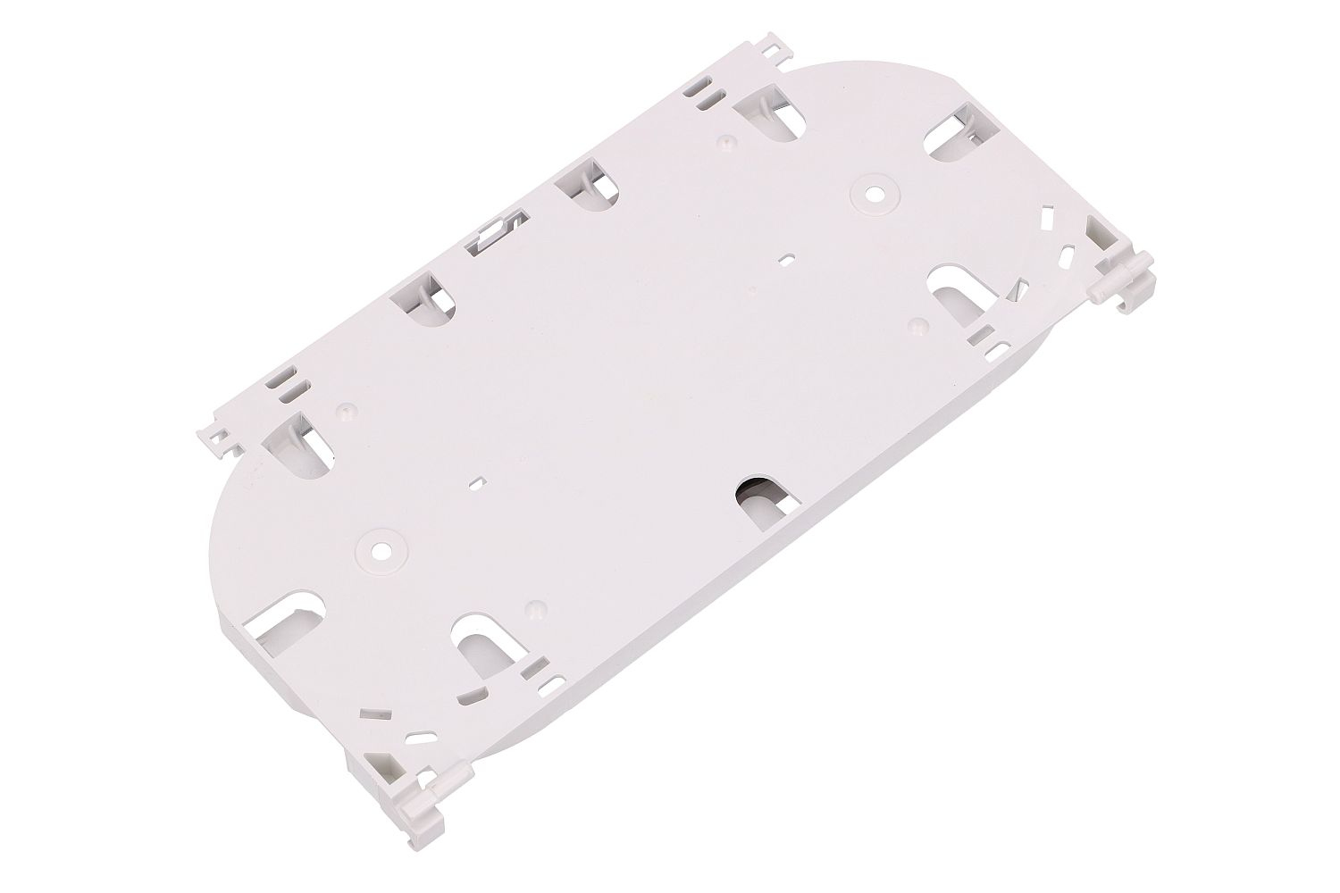 Biała plastikowa taca do łączenia światłowodów, pusta, widok z góry.