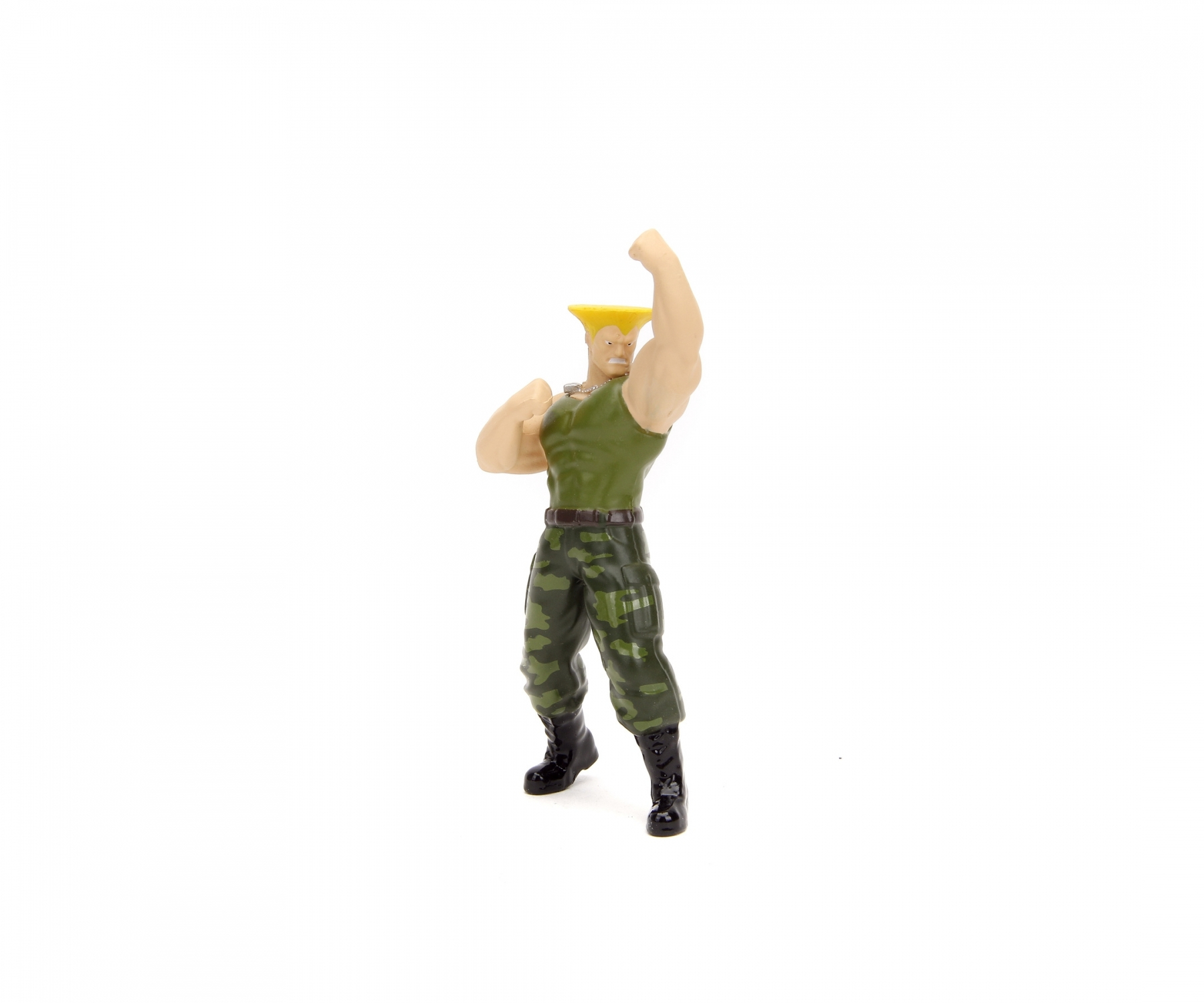 Figurka akcji zabawki przedstawiająca mężczyznę w spodniach moro, zielonej koszuli z uniesionymi ramionami.